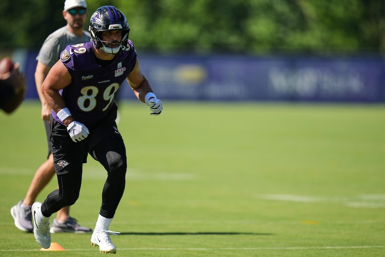 Ravens tight end Mark Andrews works out during practice on July 30.