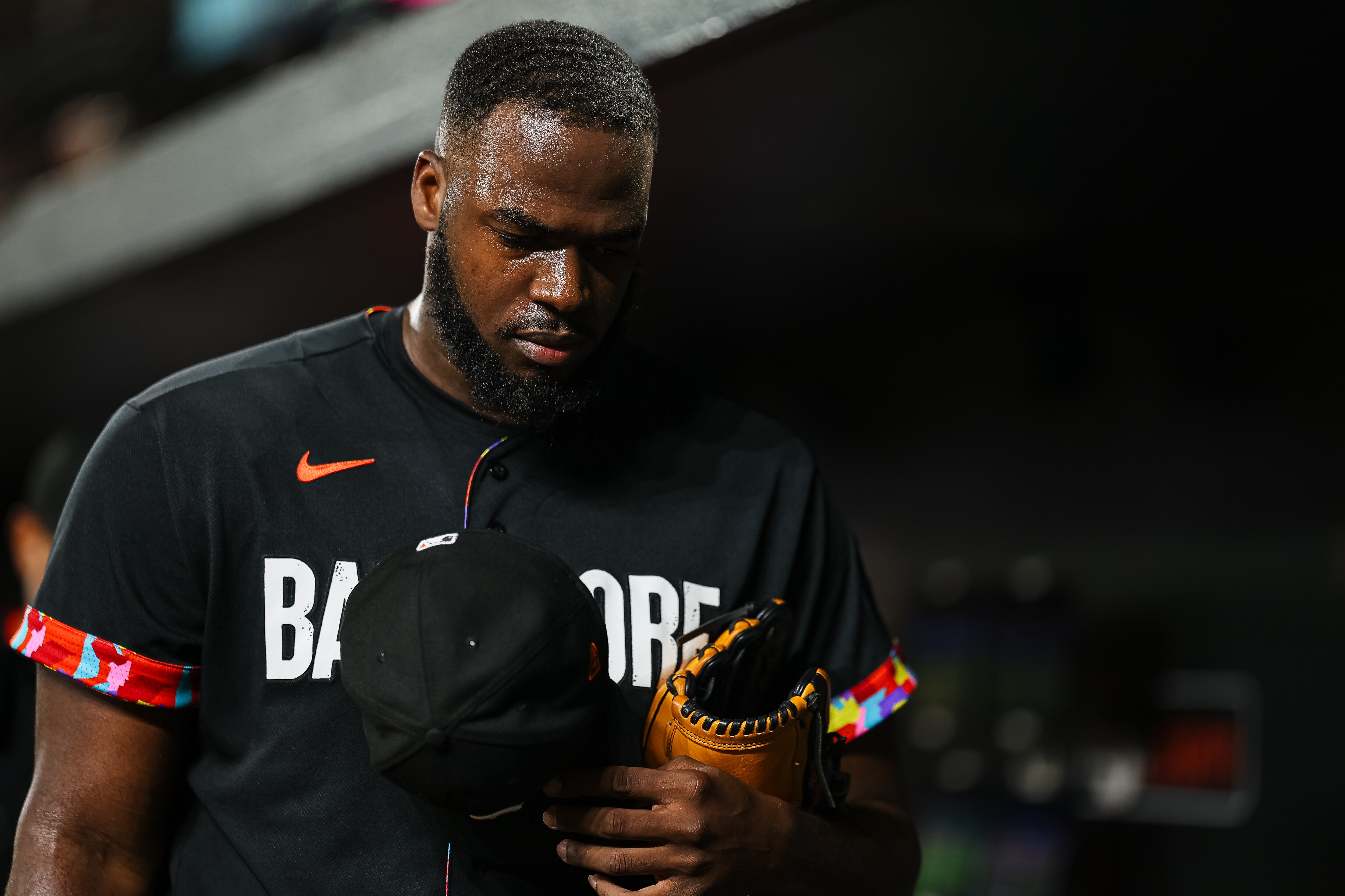 Felix Bautista, #74 of the Baltimore Orioles, walks to the clubhouse after being injured on a pitch against the Colorado Rockies during the ninth inning at Oriole Park at Camden Yards on Aug. 25, 2023 in Baltimore, Maryland.