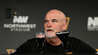 Washington Commanders head coach Dan Quinn speaks during a press conference following his team's tie with the New York Giants on Oct. 11.