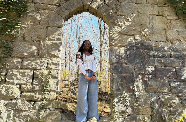 Nailah Agbodjogbe, of Towson, explores the ruins of Daniels, an old company town.