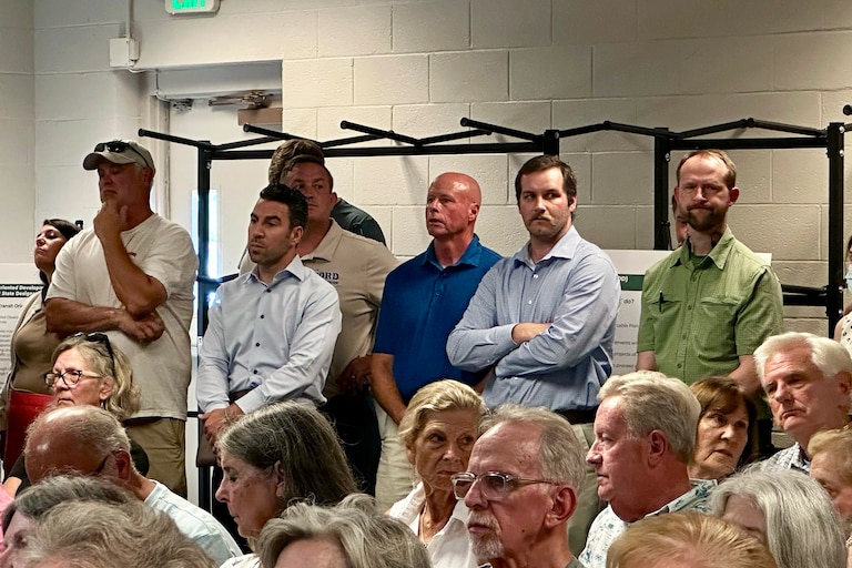 Councilman Nino Mangione, pictured on Wednesday, July 22, 2026 in Baltimore County Public Library's Cockeysville branch listens to a community input meeting about the long-delayed Lutherville Station redevelopment. Community members questioned what will happen if Lutherville Station receives state designated transit-oriented development (TOD) status. If granted by Baltimore County Council, the designation gives the project's owners the opportunity to pursue state support through grants and loans.