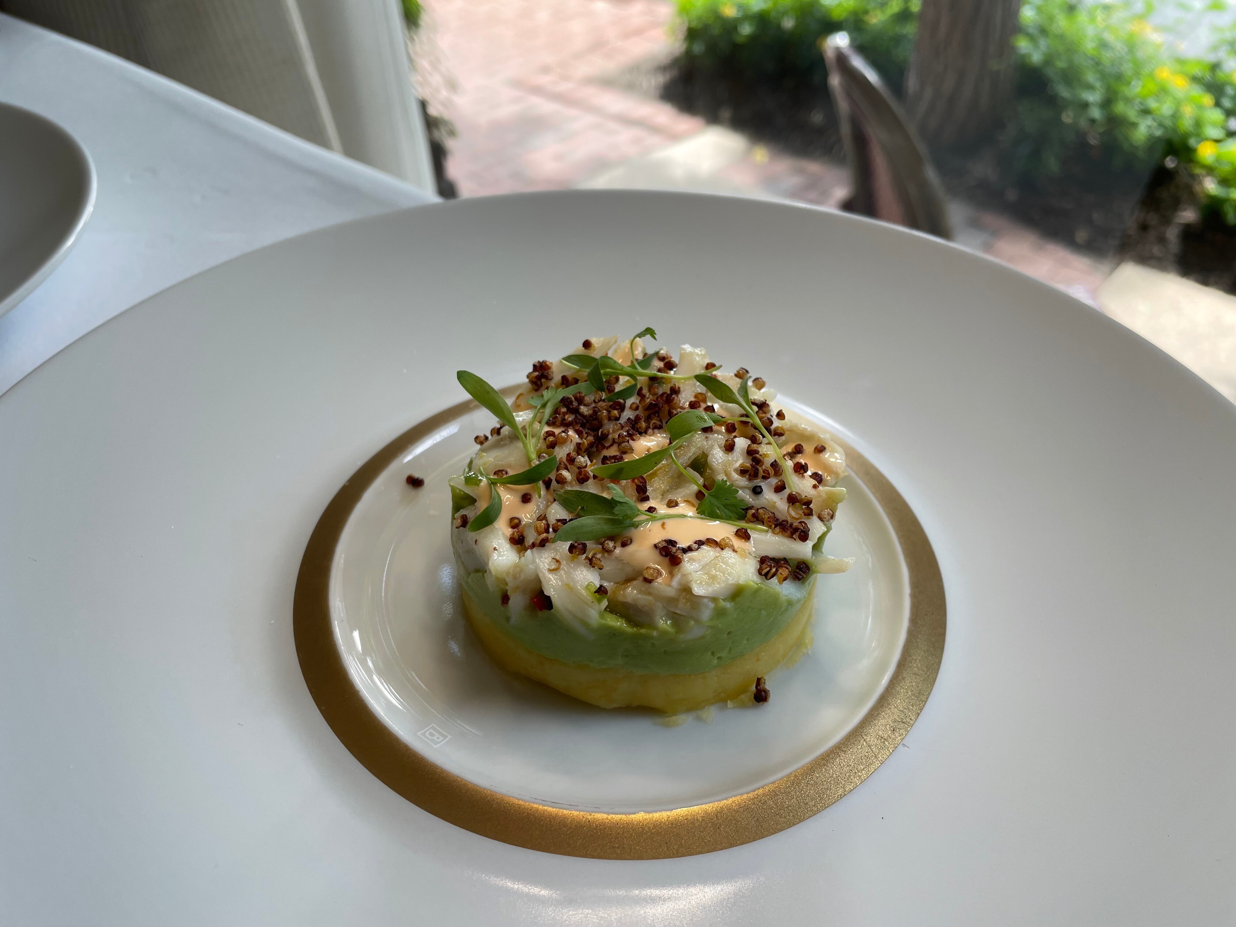 The crab causa at Bas Rouge in Easton, Maryland, features a delicate arrangement of lump crabmeat atop layers of avocado and potato.