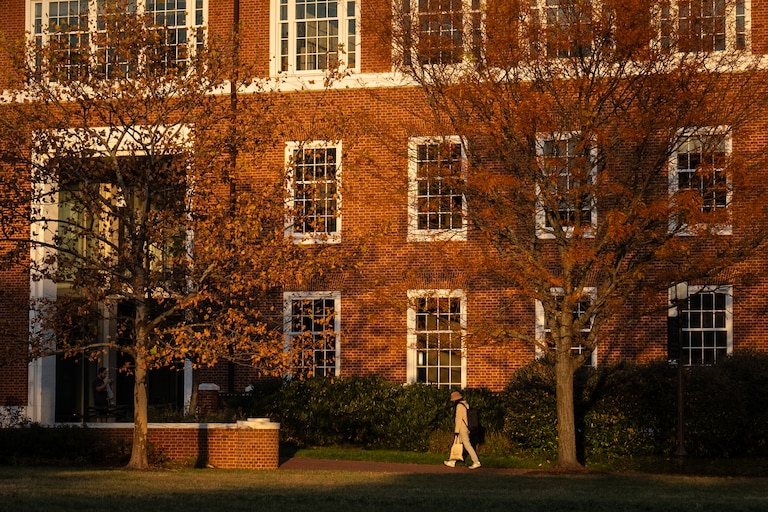 A student walks through Johns Hopkins University’s Homewood campus on Tuesday, Nov. 7, 2023.