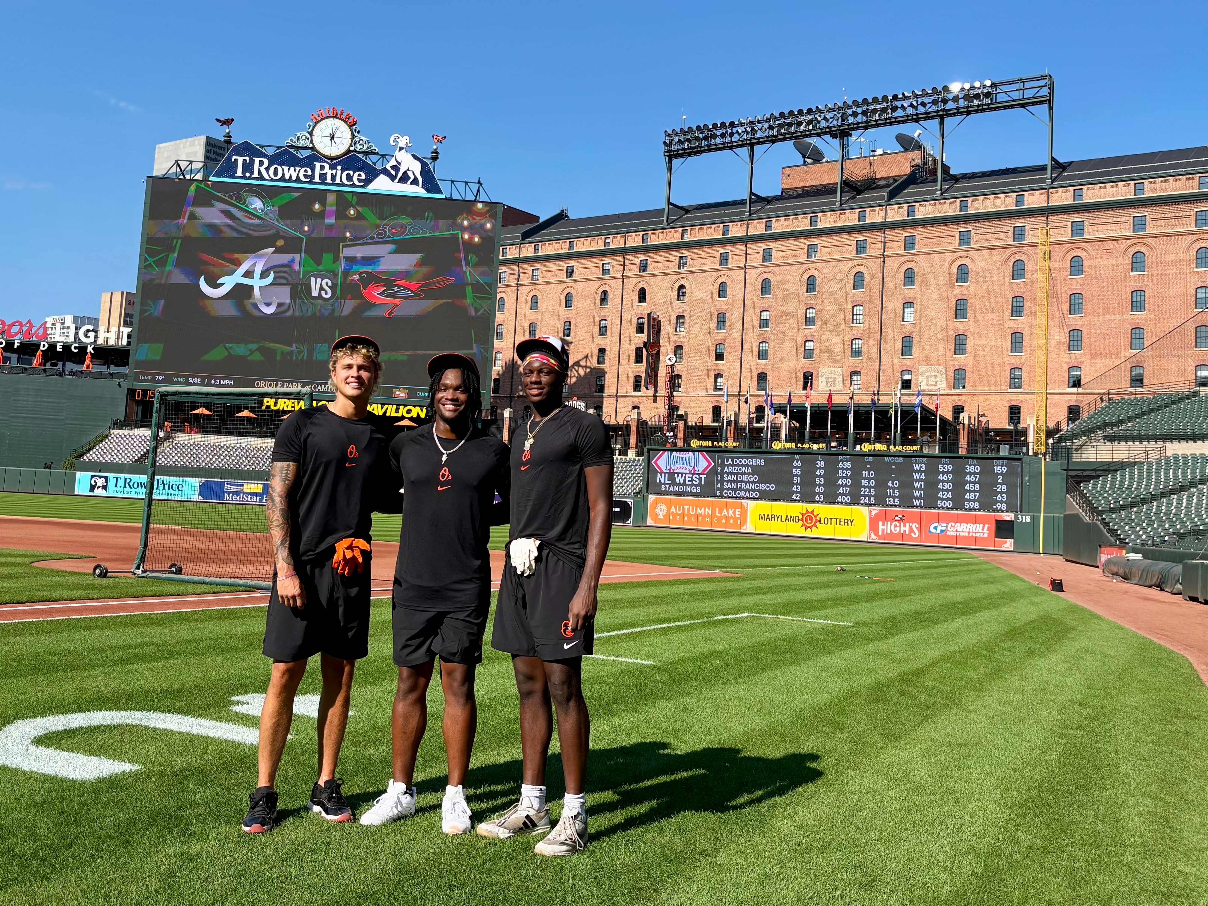 Orioles draft picks Ty Head, Eric Booth Jr. and Kevin Roberts Jr. pose at Camden Yards on Saturday, July 25, 2026 after taking batting practice.