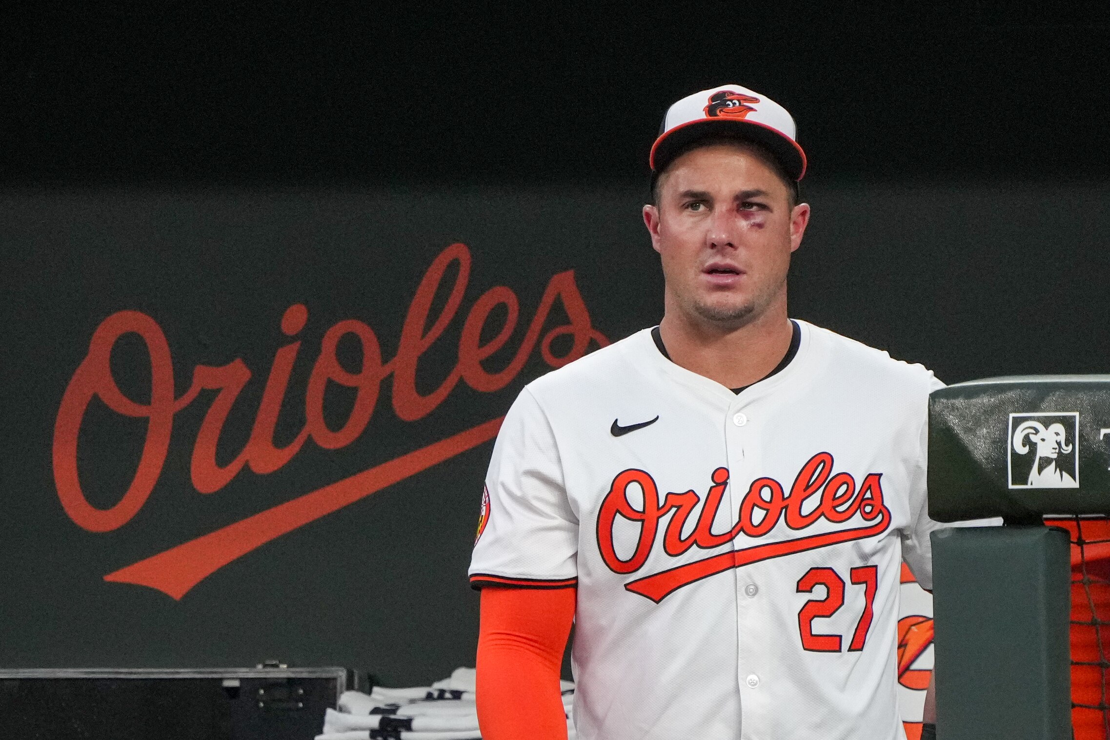 Baltimore Orioles catcher James McCann (27) is seen with a black eye in the dugout, one day after taking a pitch to the face, during a game against the Toronto Blue Jays at Camden Yards on July 30, 2024.
