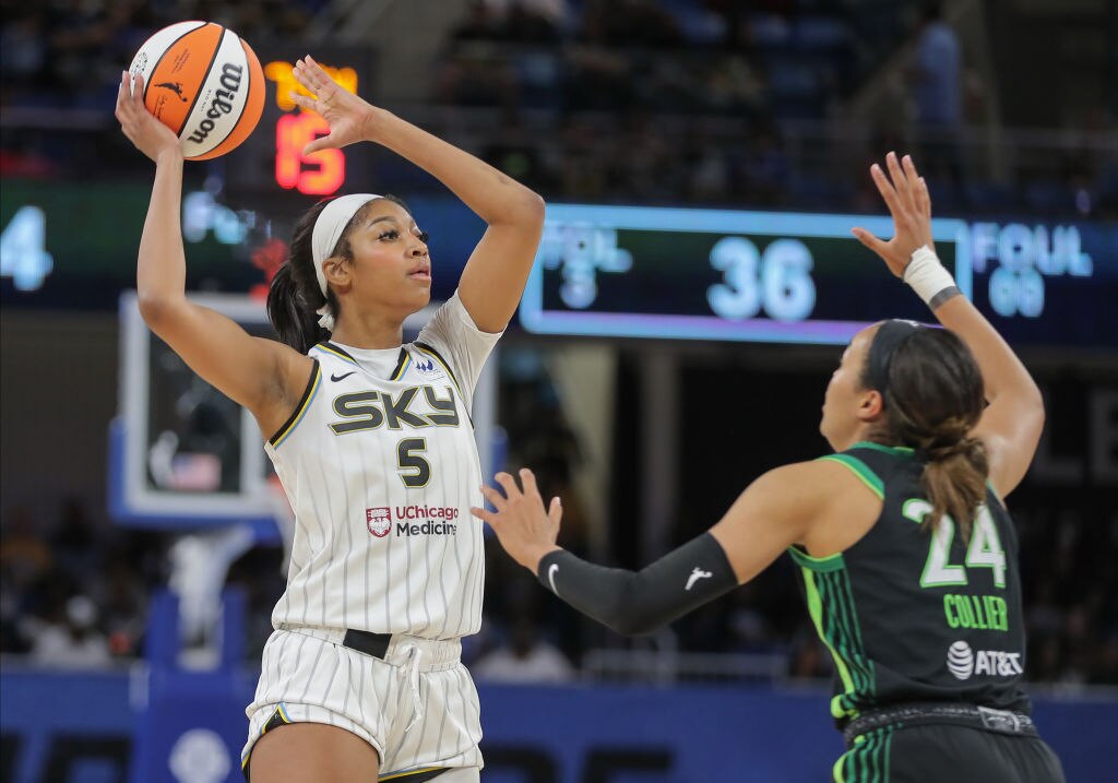 Angel Reese, #5 of the Chicago Sky, looks to pass during the second half against the Minnesota Lynx on June 30. (Photo by Melissa Tamez/Icon Sportswire via Getty Images)