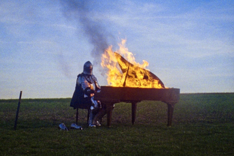 A knight in an accursed and shattered world tempts fate with a mysterious song in Albert Birney's "Gruenfeld," screening at the SNF Parkway on Saturday, May 30, 2026, at 3:30pm as part of the Baker Artist Awardee Shorts block.