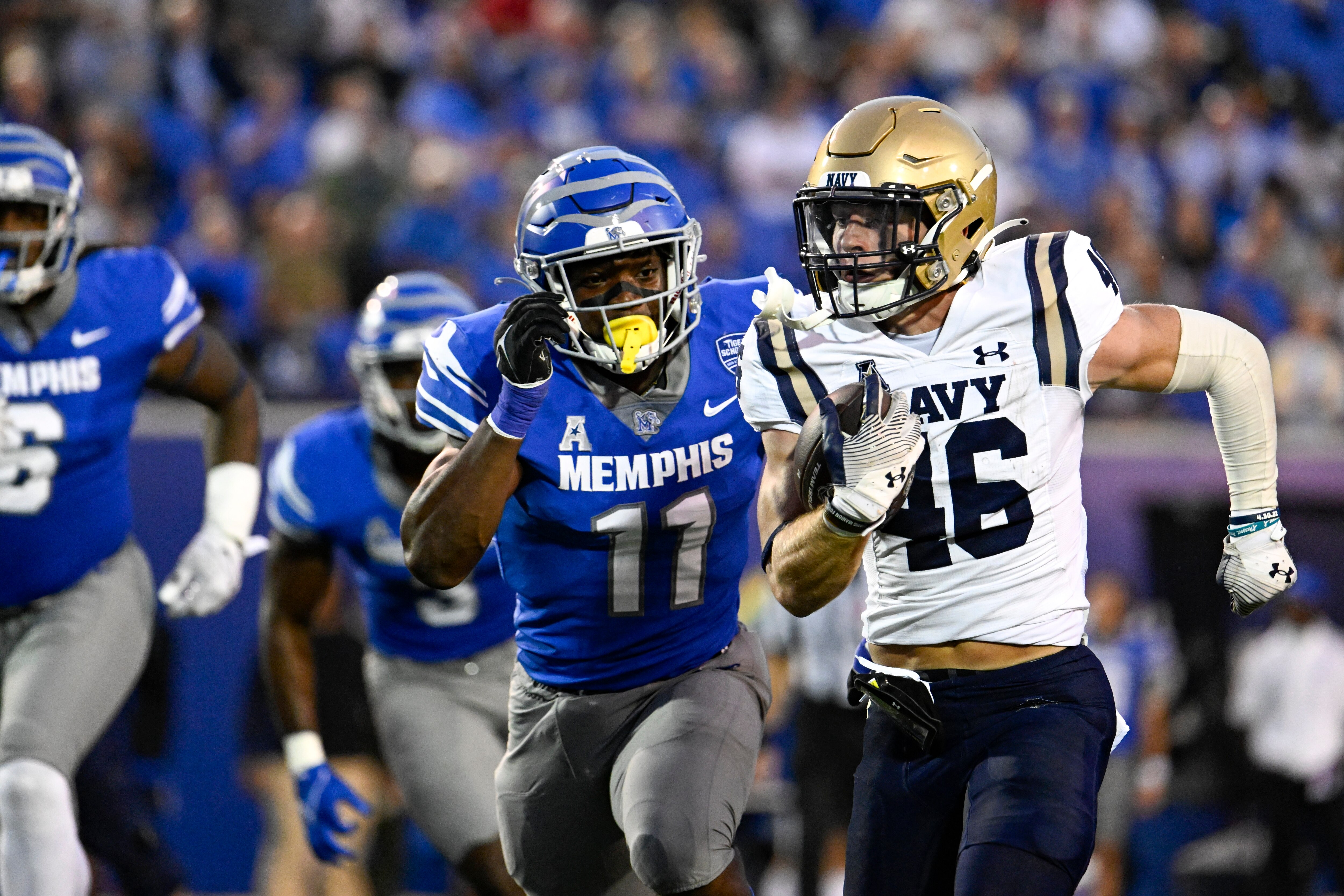 Navy fullback Alex Tecza, pictured against Memphis, scored the only touchdown in Saturday's 10-0 win over East Carolina.