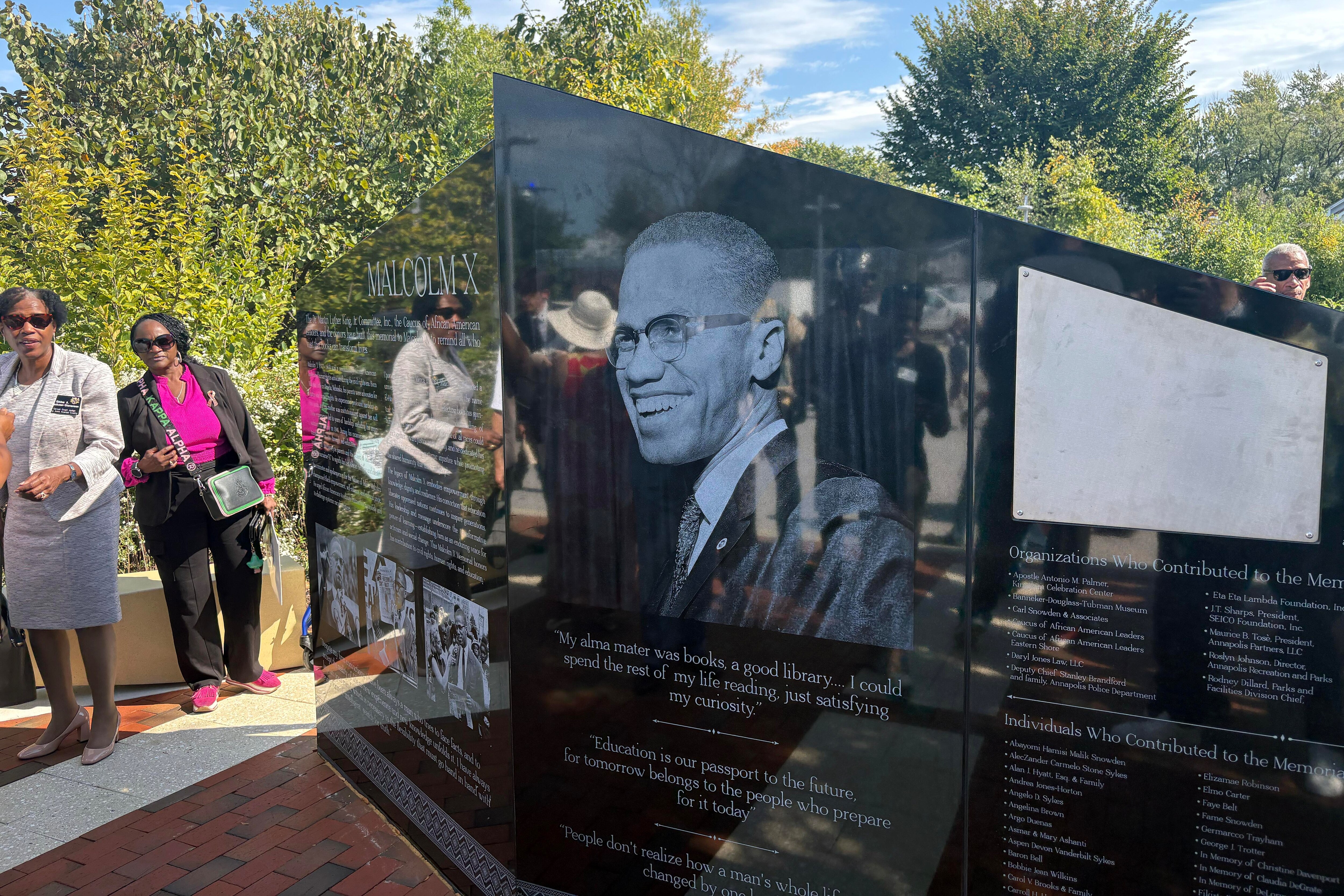 The Malcolm X Monument outside the Michael E. Busch Annapolis Library features photos and quotes from the controversial activist, along with his biography and a time capsule. The monument was unveiled Wednesday, Oct. 14.