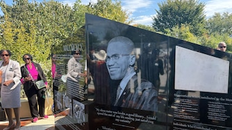 The Malcolm X Monument outside the Michael E. Busch Annapolis Library features photos and quotes from the controversial activist, along with his biography and a time capsule. The monument was unveiled Wednesday, Oct. 14.