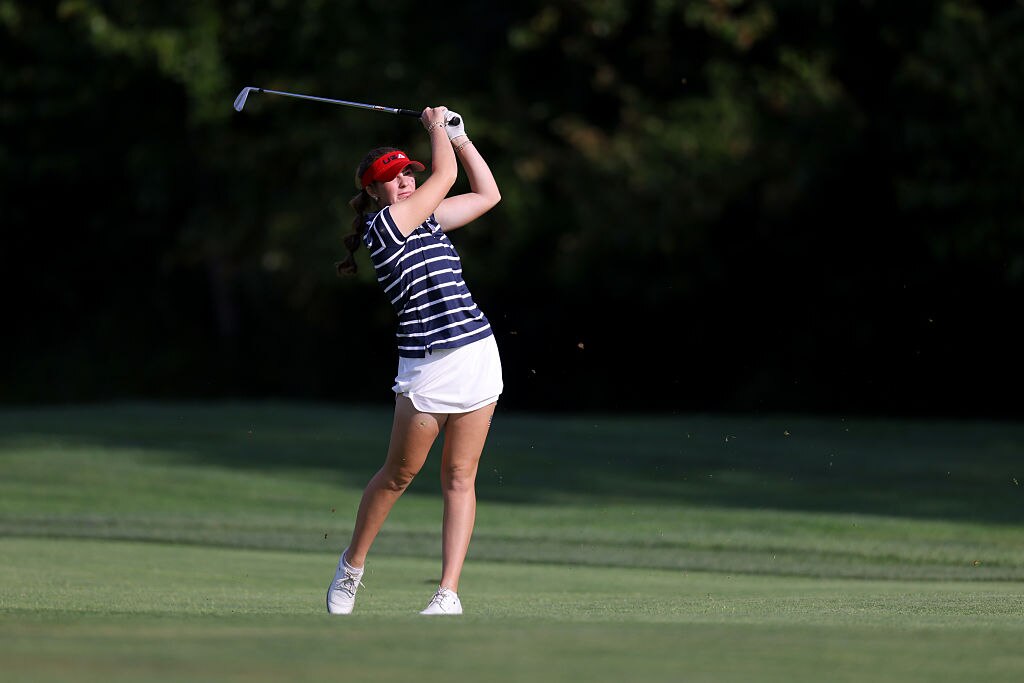 Zoe Cusack holds a golf club on her backswing at the Junior Ryder Cup at Nassau Country Club.