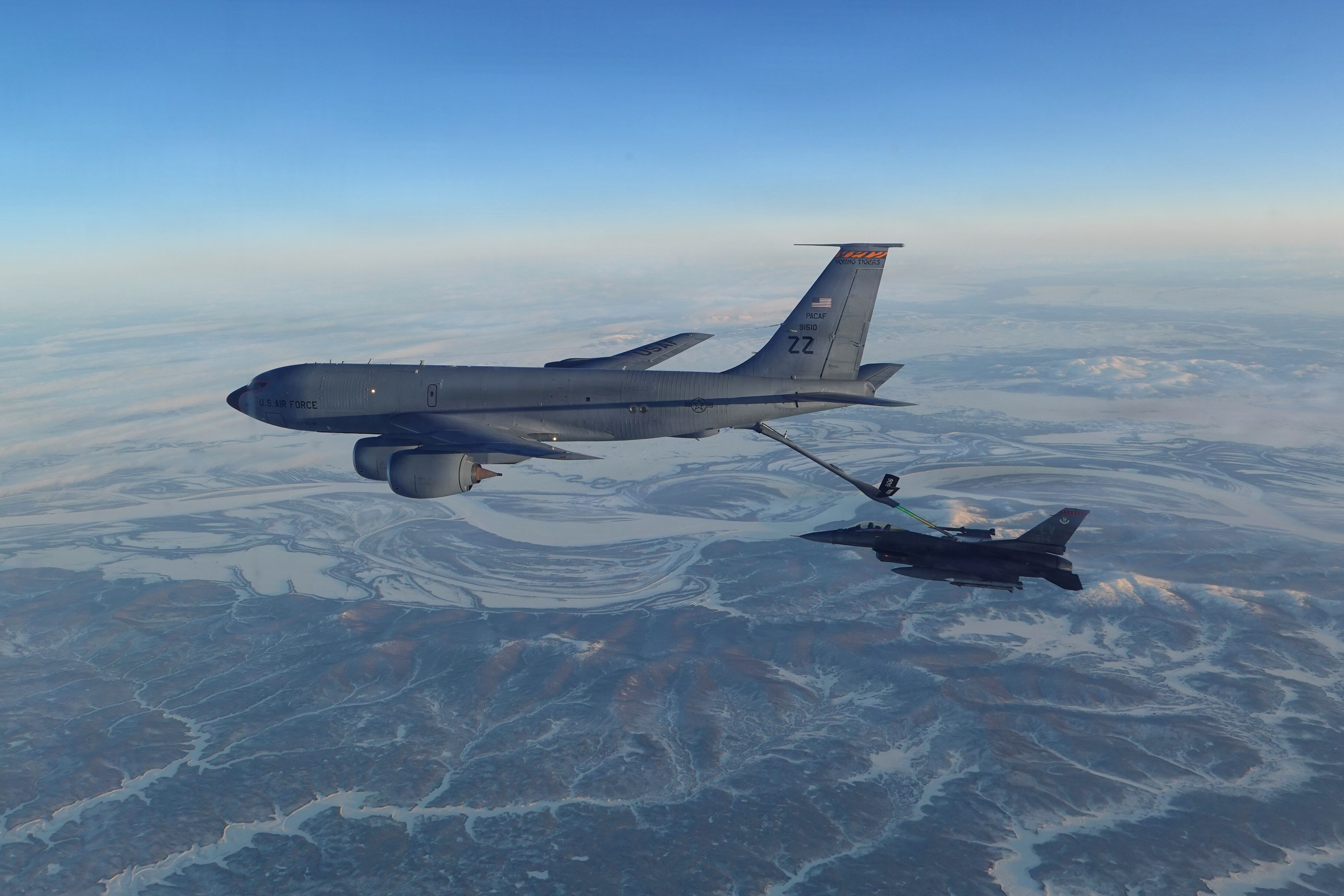 This photo provided by the U.S. Department of Defense shows a North American Aerospace Defense Command F-16 fighter refueling from a KC-135 Stratotanker over western Alaska on Thursday, Feb. 19, 2026. (U.S. Department of Defense via AP)