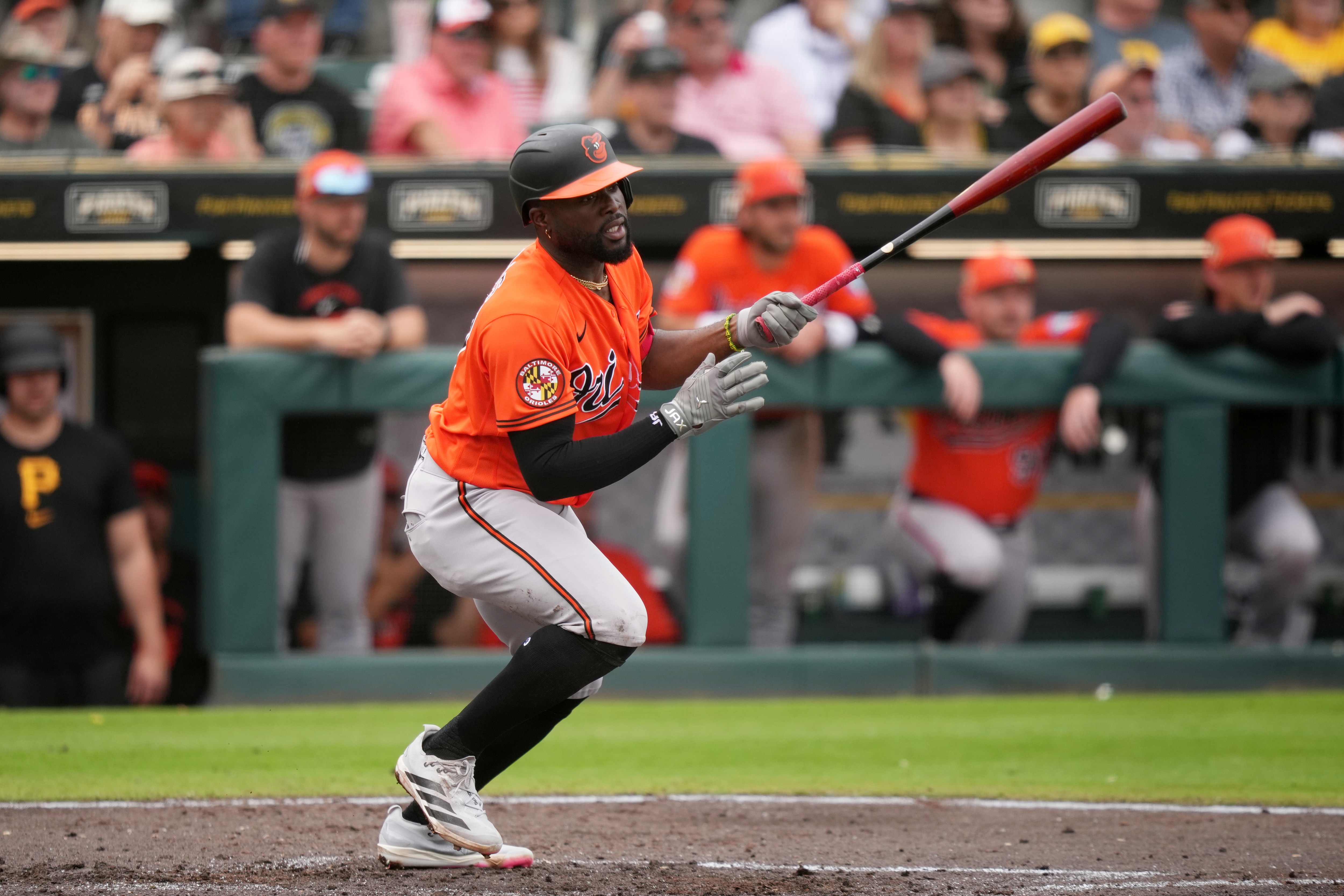 Baltimore Orioles' Bryan Ramos follows through after hitting a run-scoring single against Pittsburgh Pirates pitcher Justin Lawrence during the sixth inning of a spring training baseball game, Friday, Feb. 27, 2026, in Bradenton.