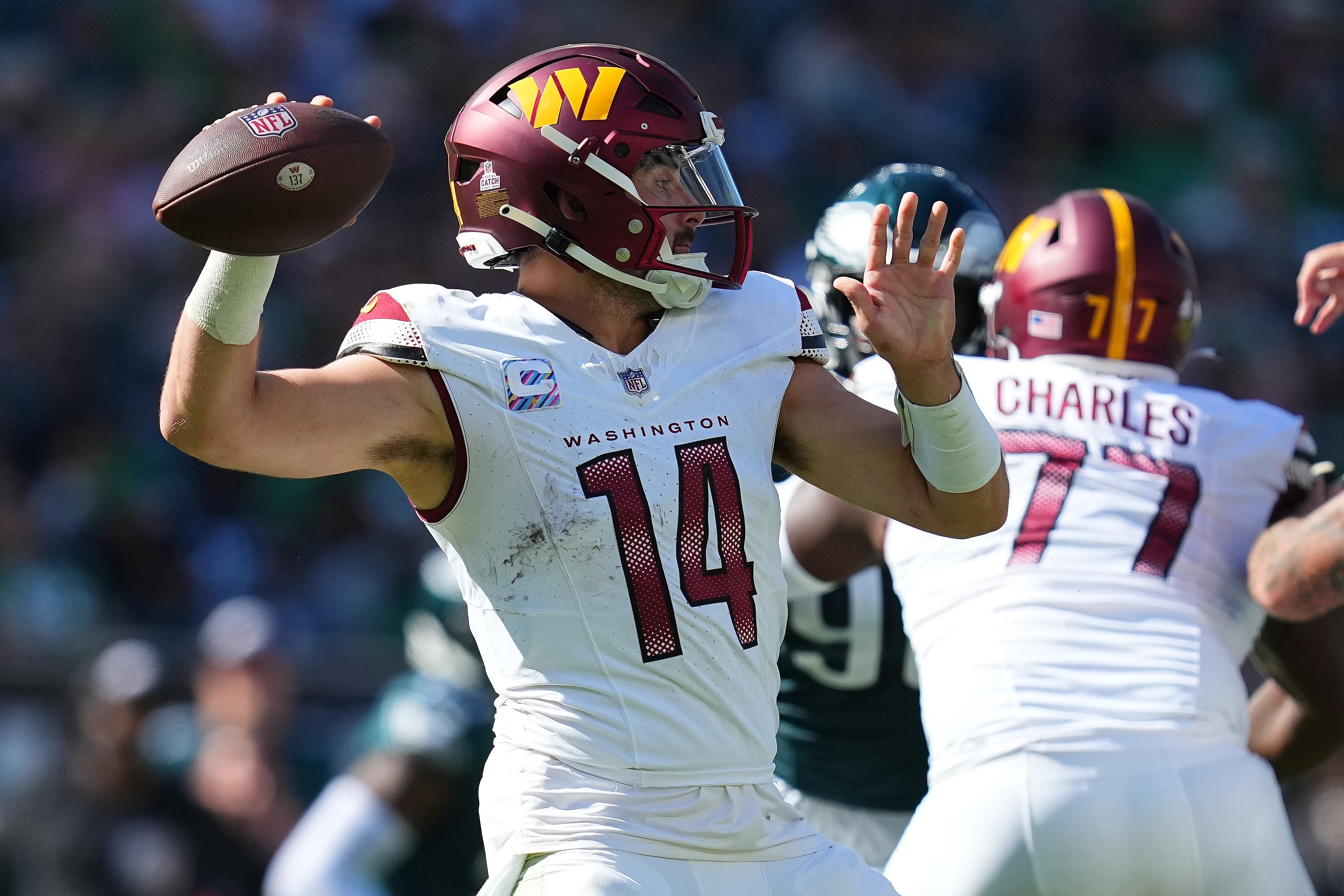 Commanders quarterback Sam Howell throws a pass during the third quarter Sunday at Philadelphia.