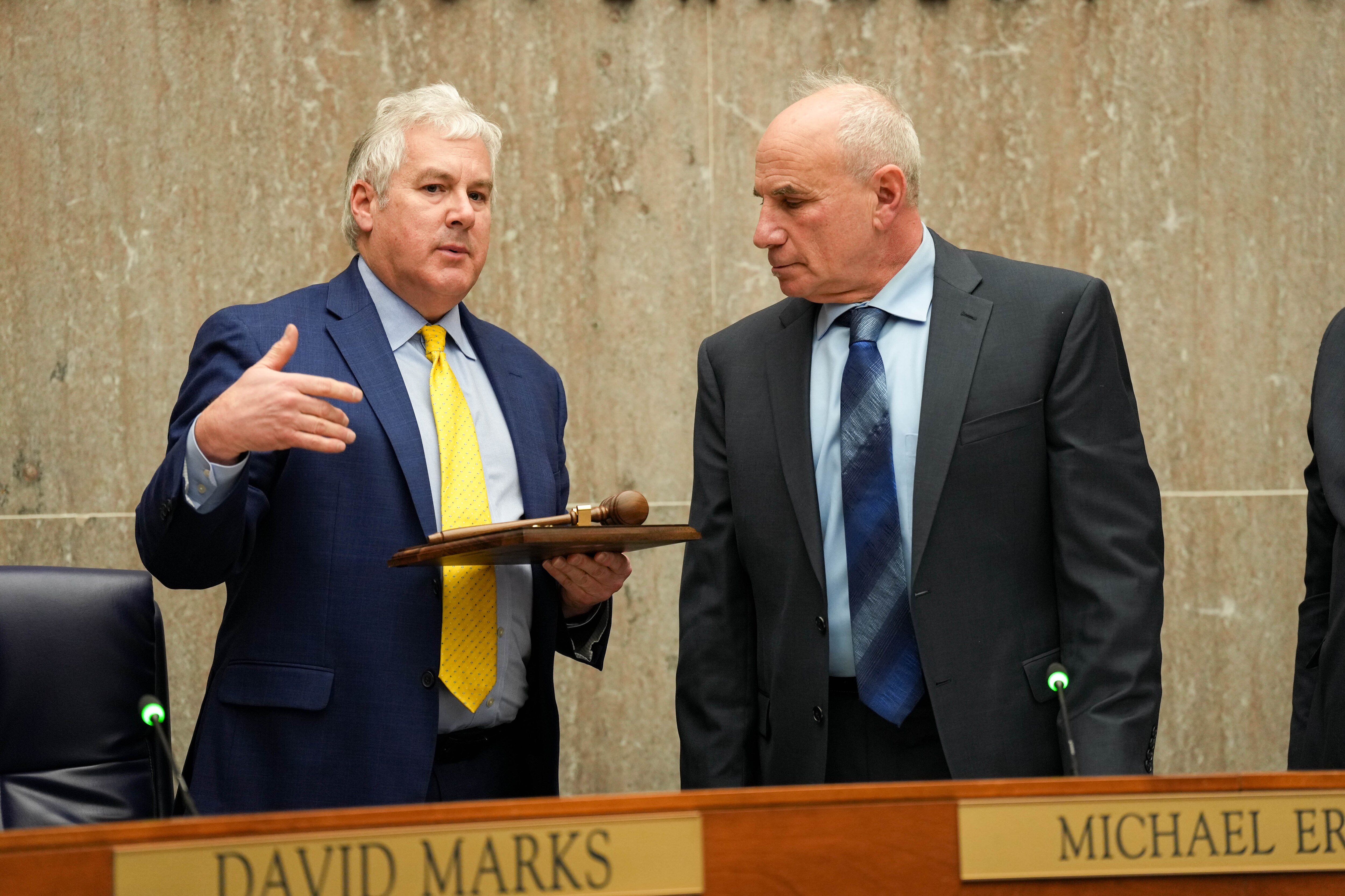 Michael Ertel, left, presents an award to fellow council member Izzy Patoka for his leadership in the last year during a Baltimore County Council meeting in Towson, Md. on Tuesday, January 7, 2025.