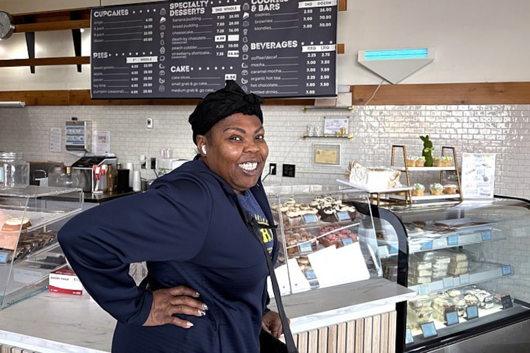 Demitria Scott picks up cakes for her 59th birthday at Fresh Bakery in Owings Mills.