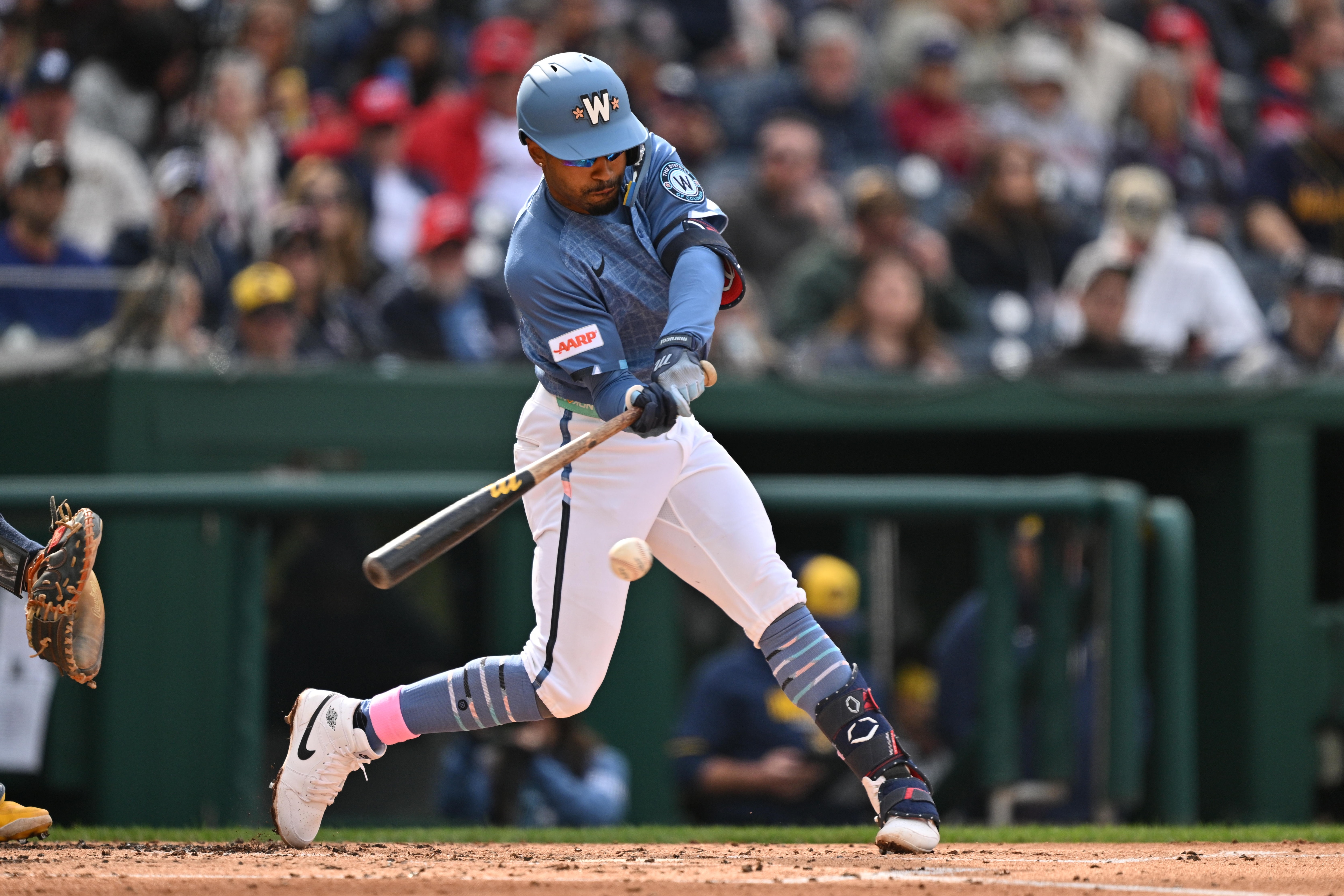 Nasim Nuñez of the Nationals singles in the third inning of Saturday’s game, a 4-1 loss to the Brewers.