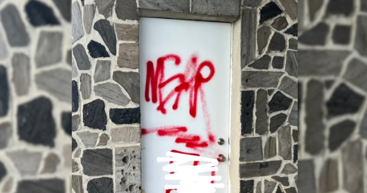 A red swastika was painted on a door at United Hebrew Cemetery in Rosedale. Credit: WJZ-TV.