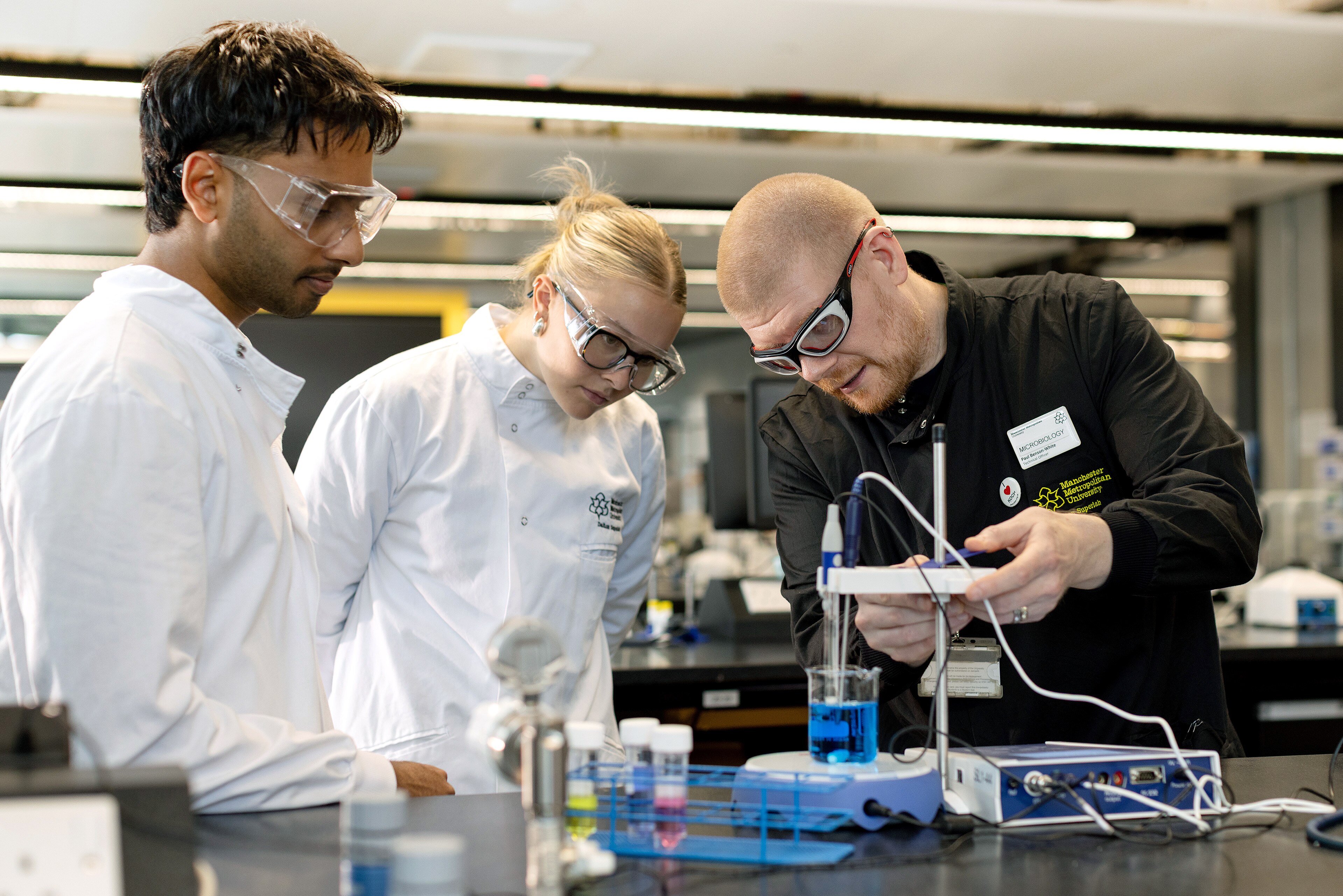 Students work in a microbiology lab at Manchester Metropolitan University, in England.