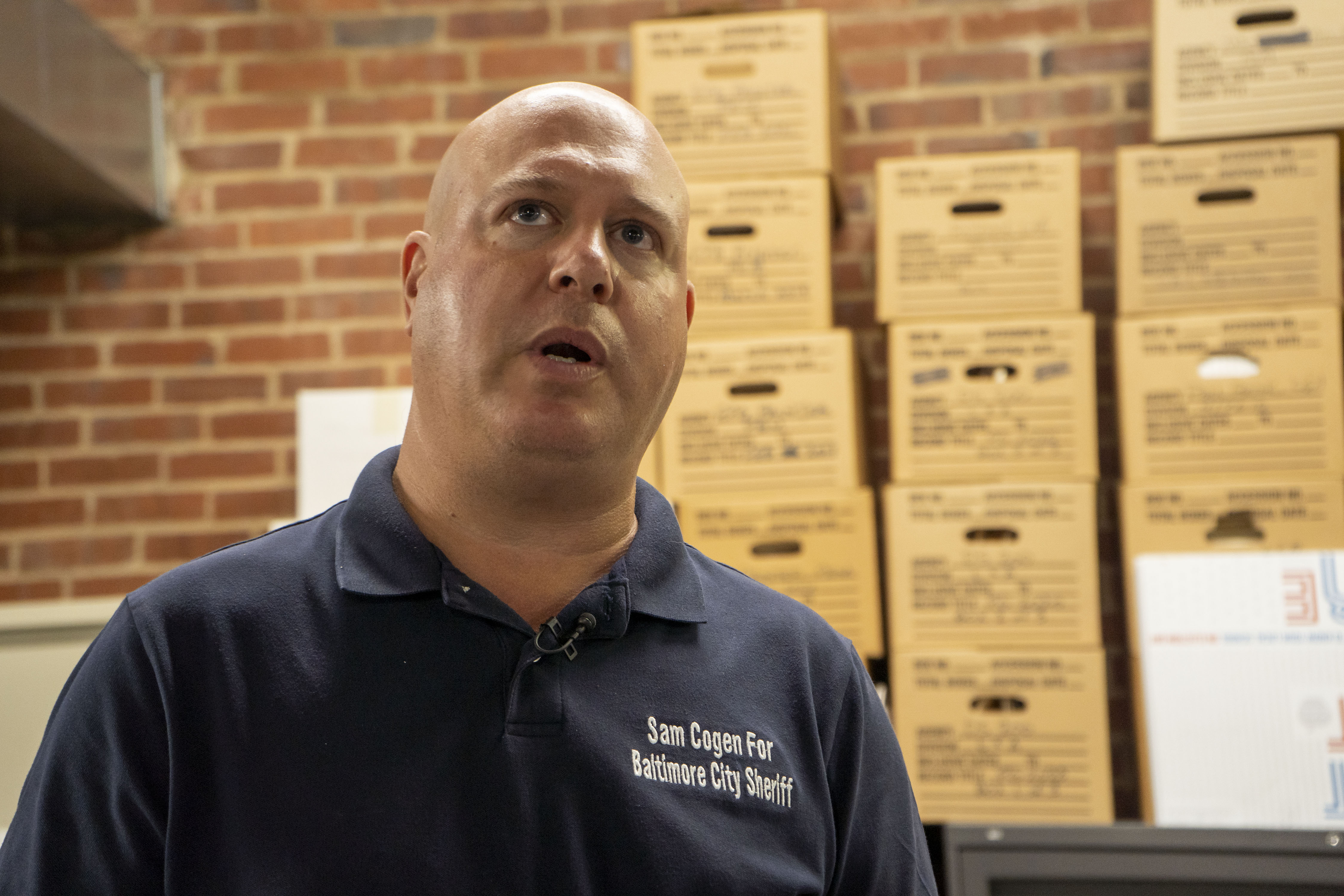 Sam Cogen, running for Baltimore City Sheriff, speaks with reporters at the counting of mail-in ballots in Baltimore City.