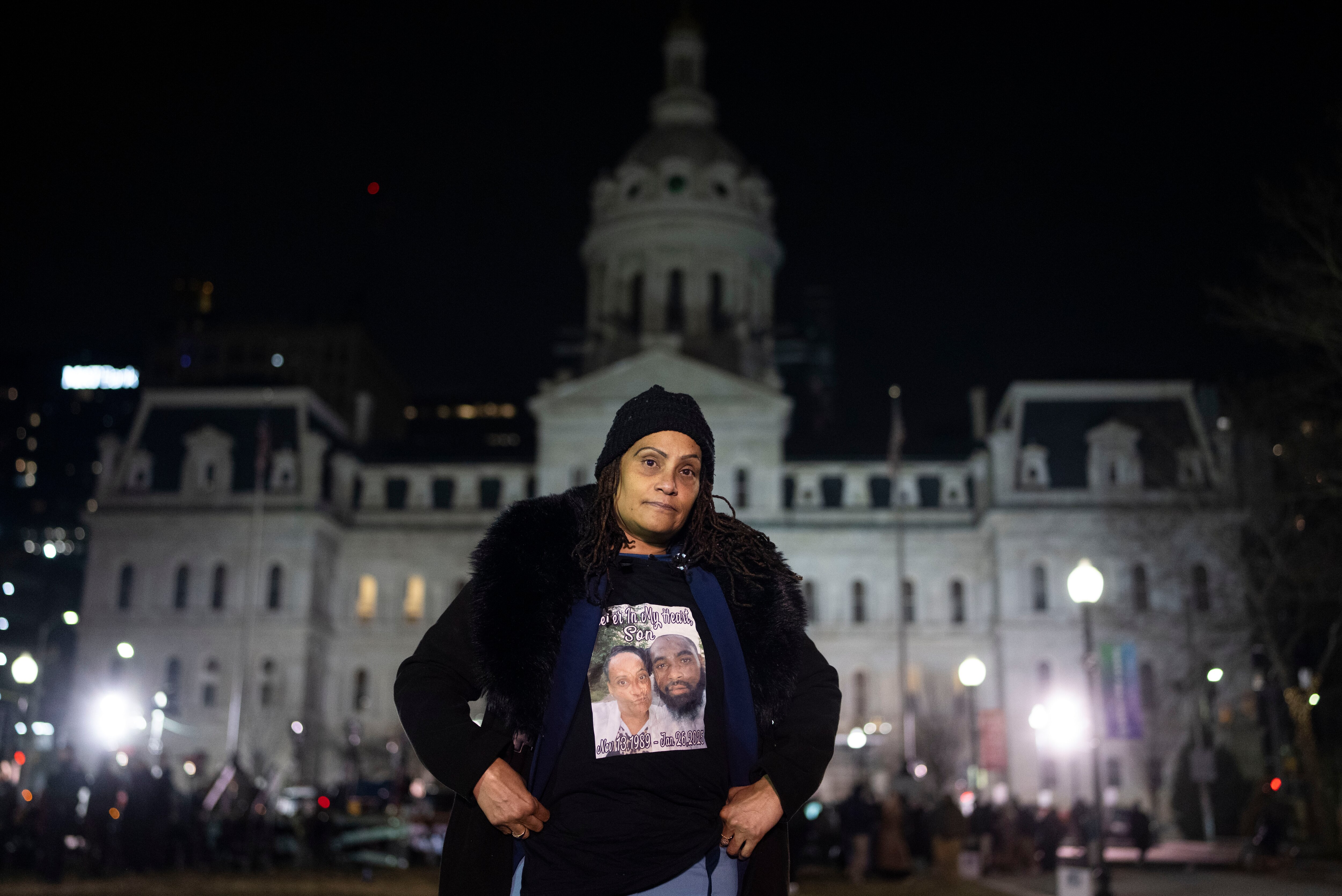 Karen Fanning wears a shirt featuring her son, Justin Davis, who was murdered on Jan. 26, at Monday night’s annual vigil of remembrance at the Baltimore War Memorial. 