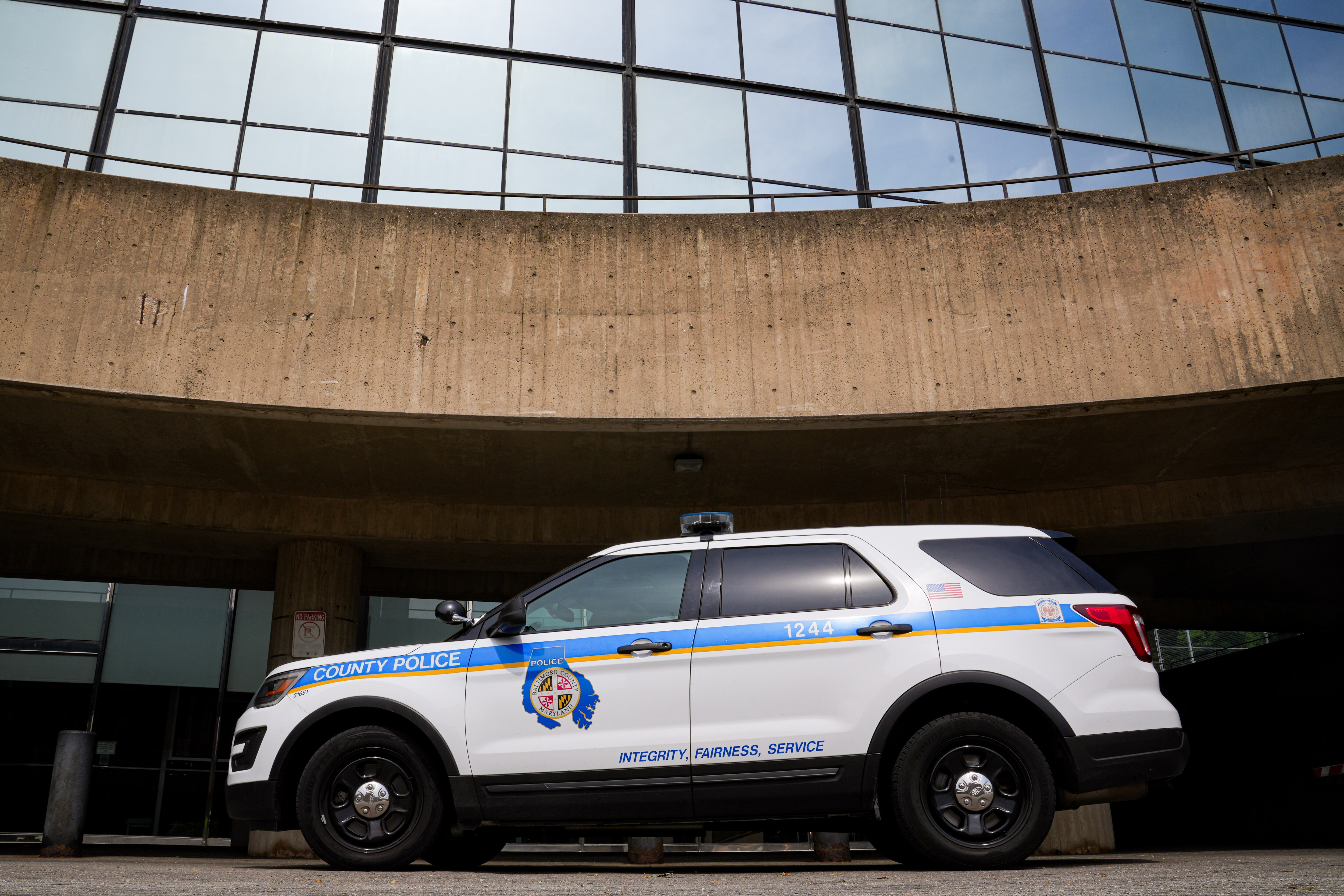 6/16/22—A Baltimore County police car sits outside of the Public Safety Building and Police Department in Towson.