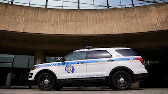 6/16/22—A Baltimore County police car sits outside of the Public Safety Building and Police Department in Towson.
