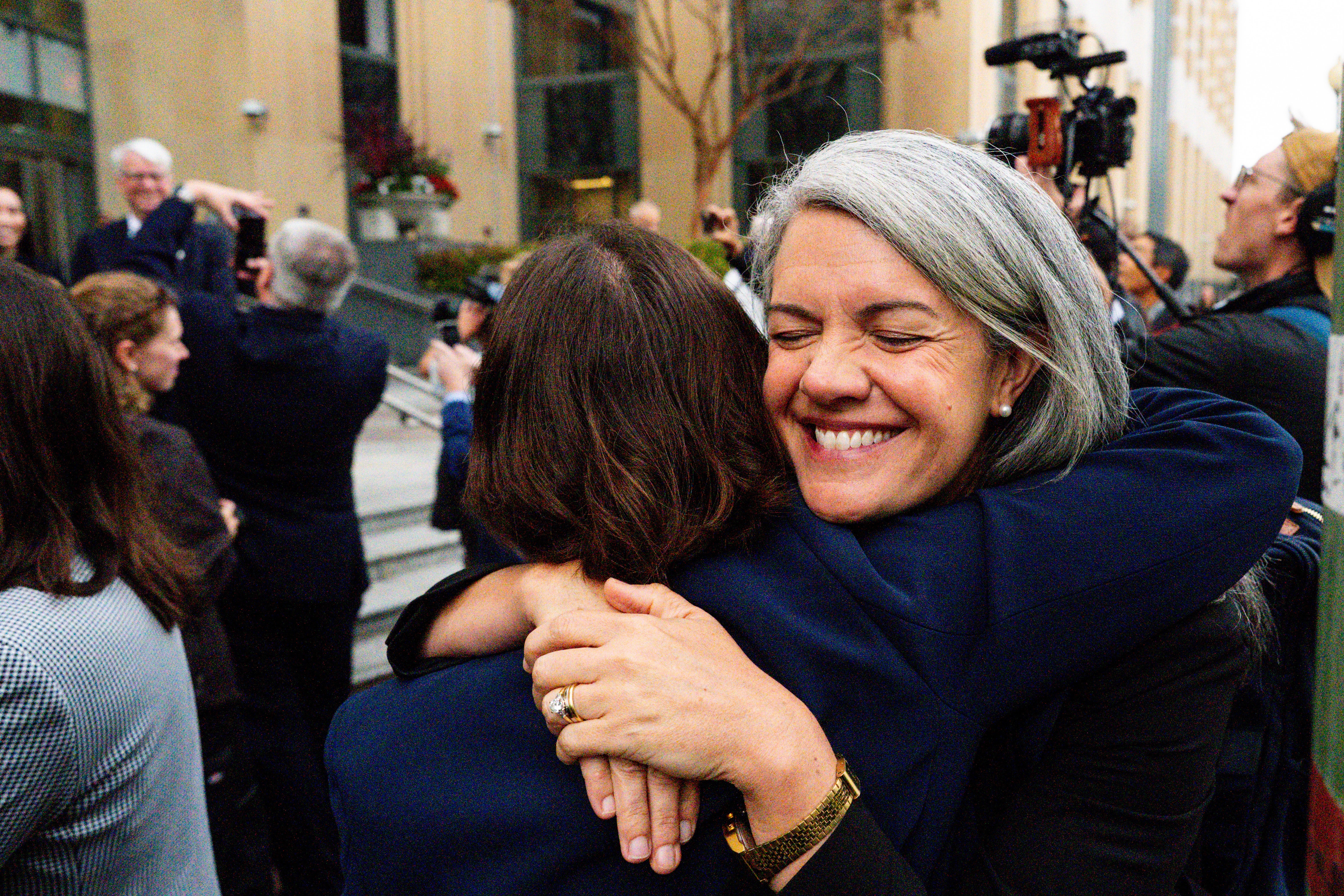 Colorado Solicitor General Shannon Stevenson, right, hugs a colleague outside of court after tech giant Meta agreed to pay $17 billion as part of a settlement to end a landmark trial over teen social media addiction in Oakland, Wednesday, Aug. 26, 2026.