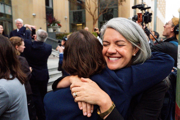 Colorado Solicitor General Shannon Stevenson, right, hugs a colleague outside of court after tech giant Meta agreed to pay $17 billion as part of a settlement to end a landmark trial over teen social media addiction in Oakland, Wednesday, Aug. 26, 2026.