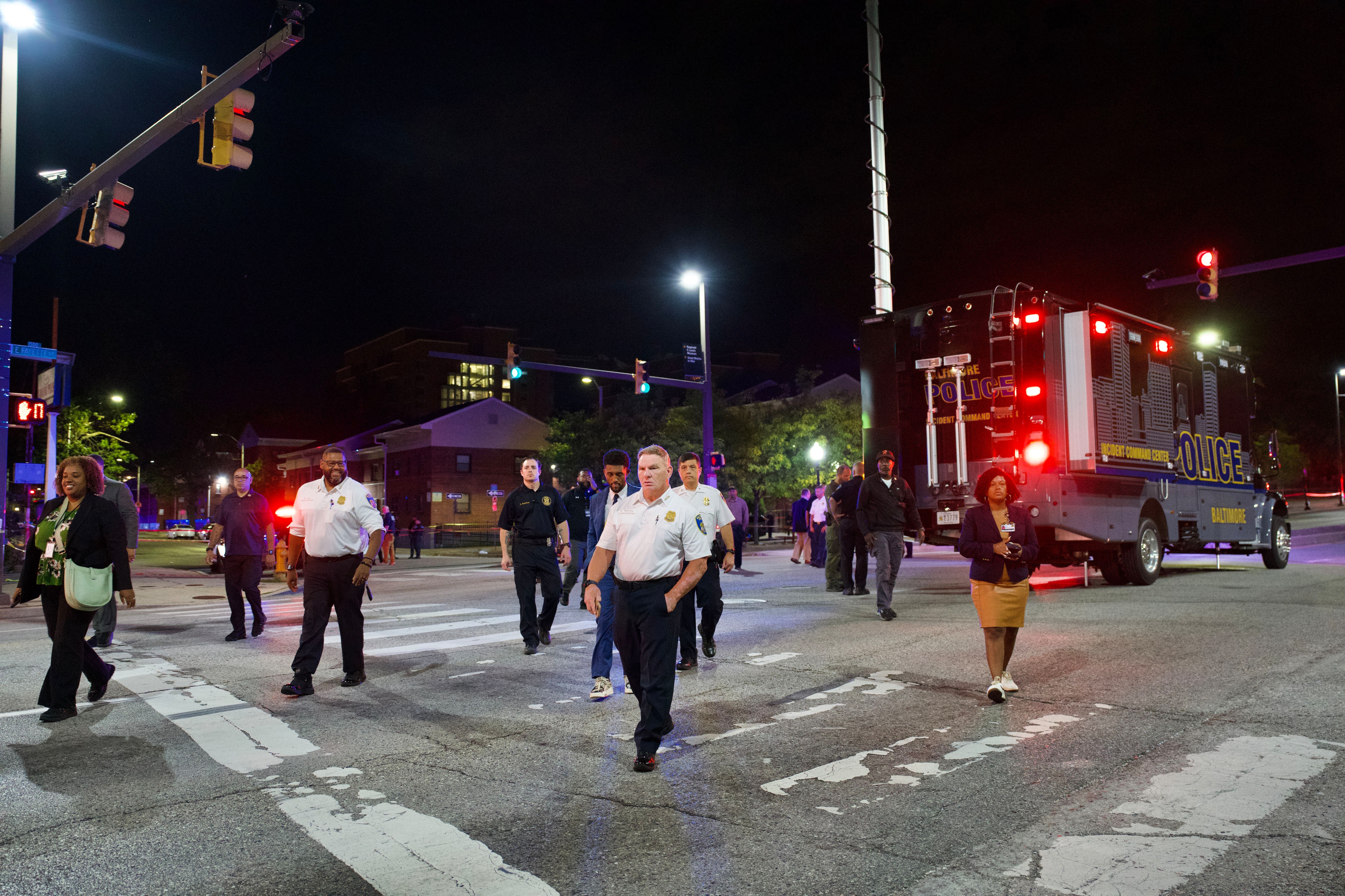 Baltimore Police Commissioner Richard Worley walks through the intersection of North Caroline and East Fayette streets on Sept. 16, after multiple people were shot in Baltimore’s Washington Hill neighborhood, police said.