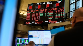 Traders work on the floor at the New York Stock Exchange in New York, Monday, March 2, 2026. (AP Photo/Seth Wenig)