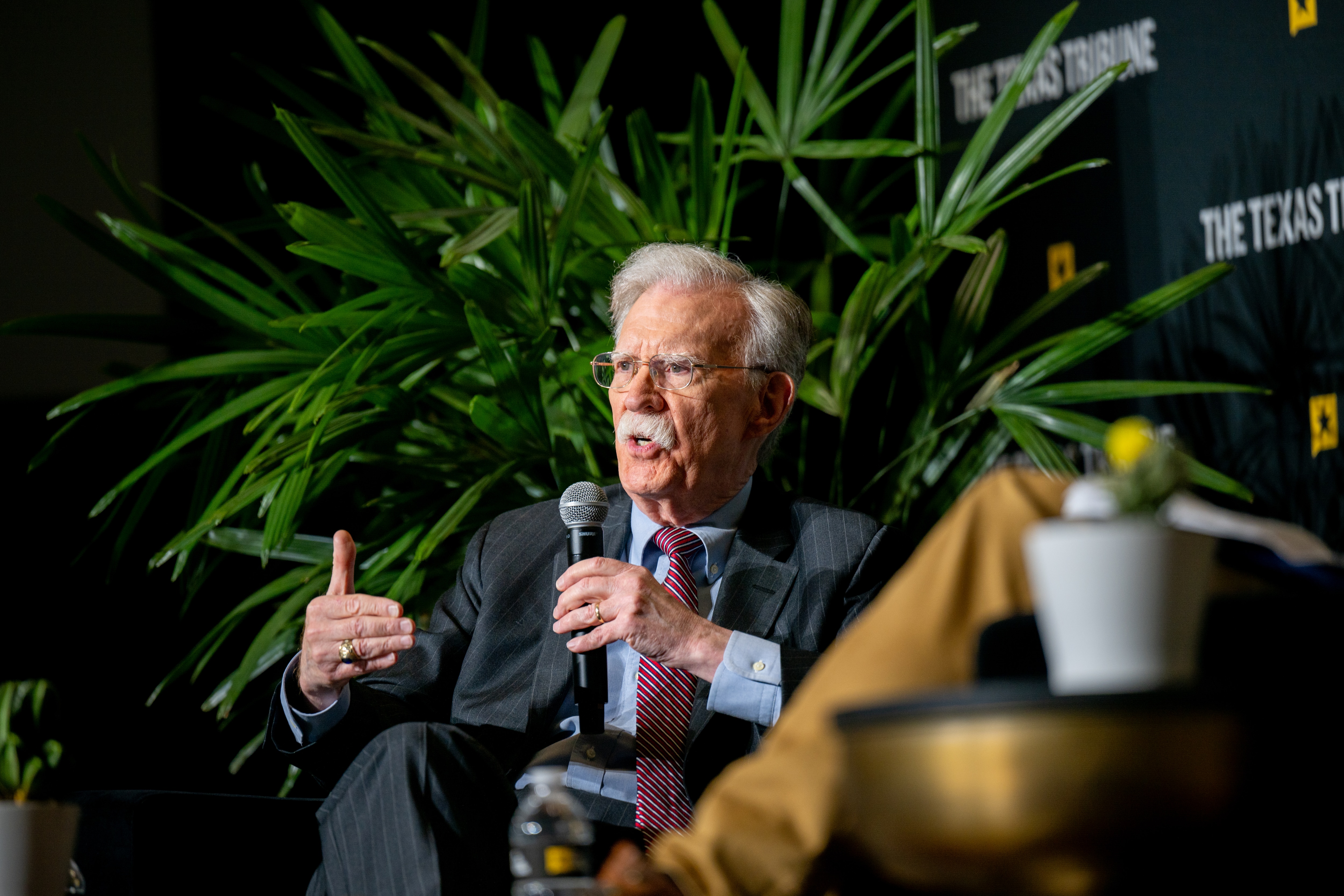 Attorney and former Trump administration national security advisor John Bolton speaks with historian Garrett Graff at the First Baptist Church during the 2025 Texas Tribune Festival on November 13, 2025 in Austin, Texas. Bolton and Graff convened for an interview, discussing Bolton's time and experience under the Trump administration.