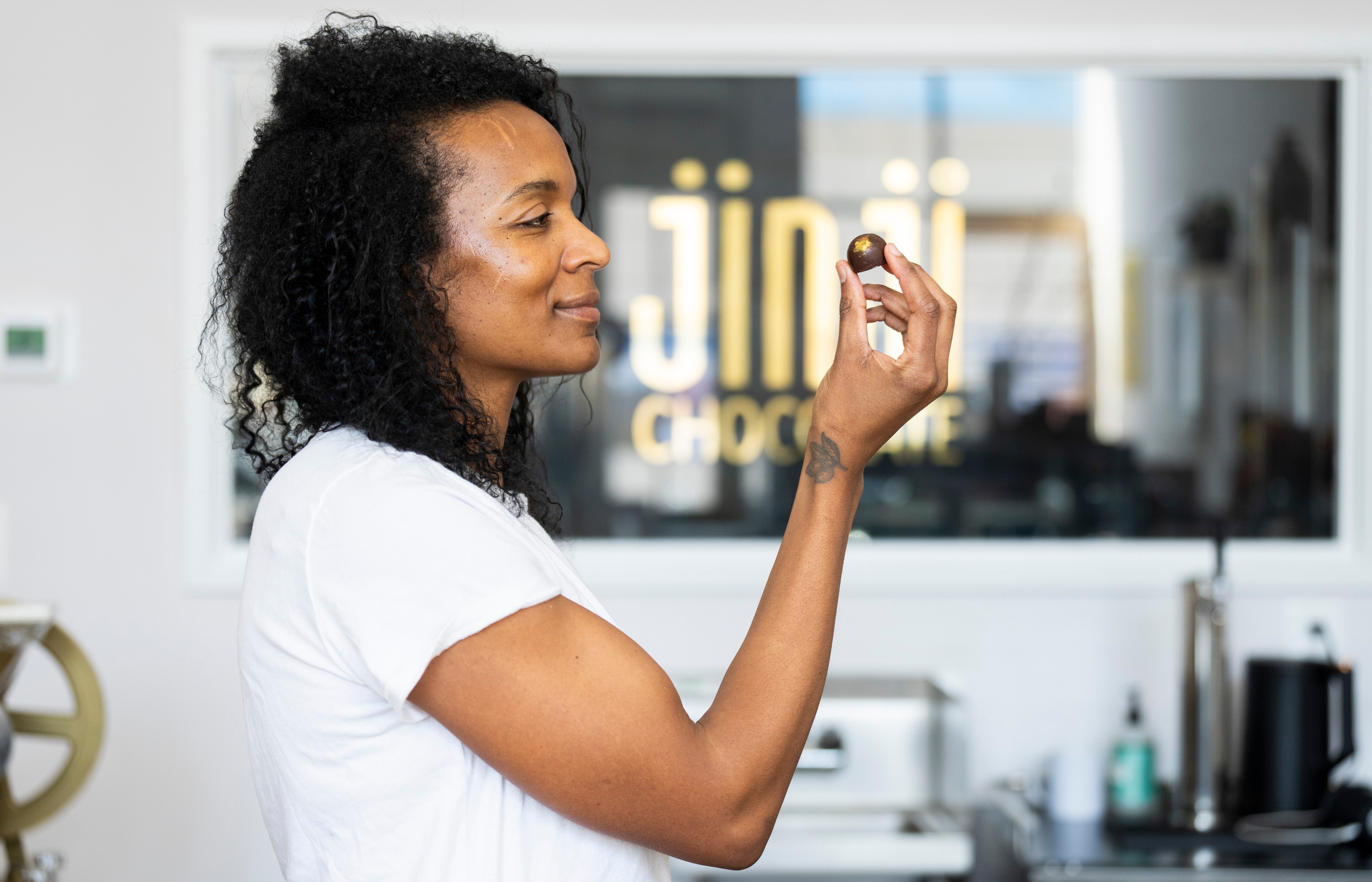 Jinji Fraser is a chocolate-maker with a shop in Waverly.