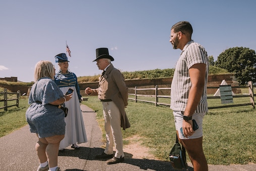 Ray Snyder and Gayle Economos stop to greet guests, Vanessa Oliveras and Emmanuel Nieves from out of state on September 8th 2024 at Fort McHenry in Baltimore City.