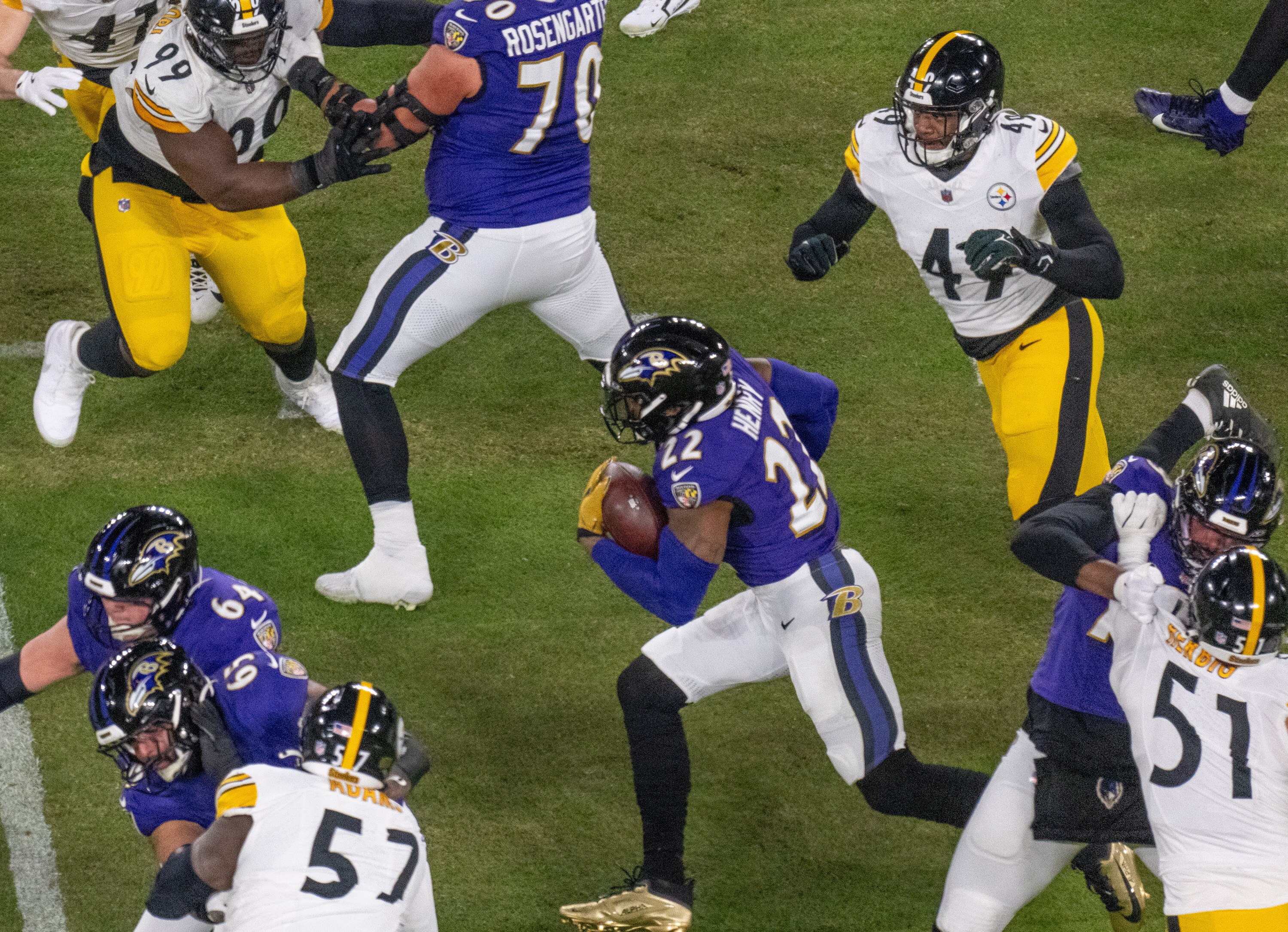 Baltimore Ravens running back Derrick Henry (22) rushes for a 1st down in the 1st quarter as the Baltimore Ravens host the Pittsburgh Steelers in the AFC wild card playoff game at M&T Bank Stadium on Saturday, January 11.