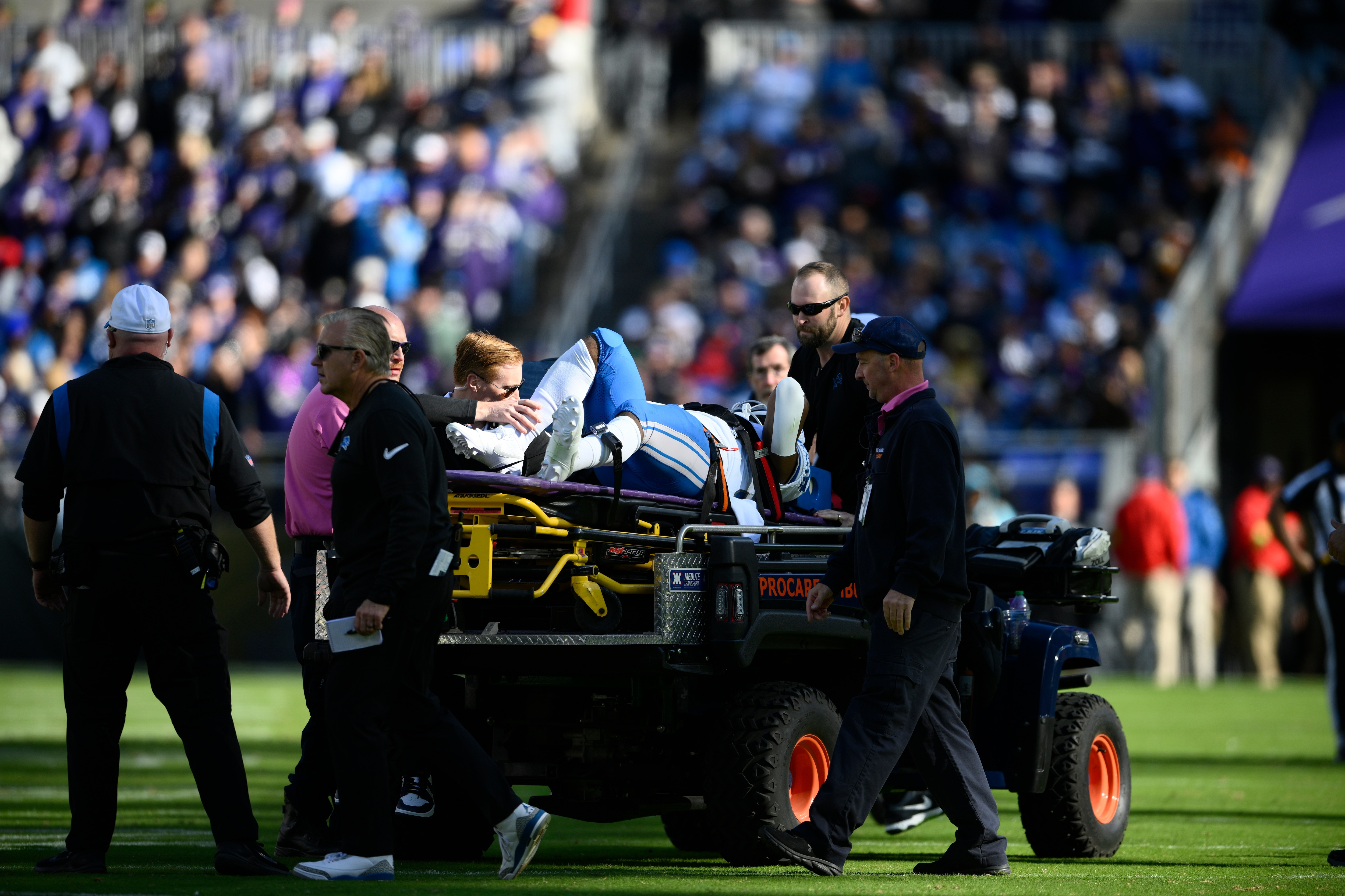 Lions kick returner Mohamed Ibrahim is carted off the field during the second half Sunday at M&T Bank Stadium.