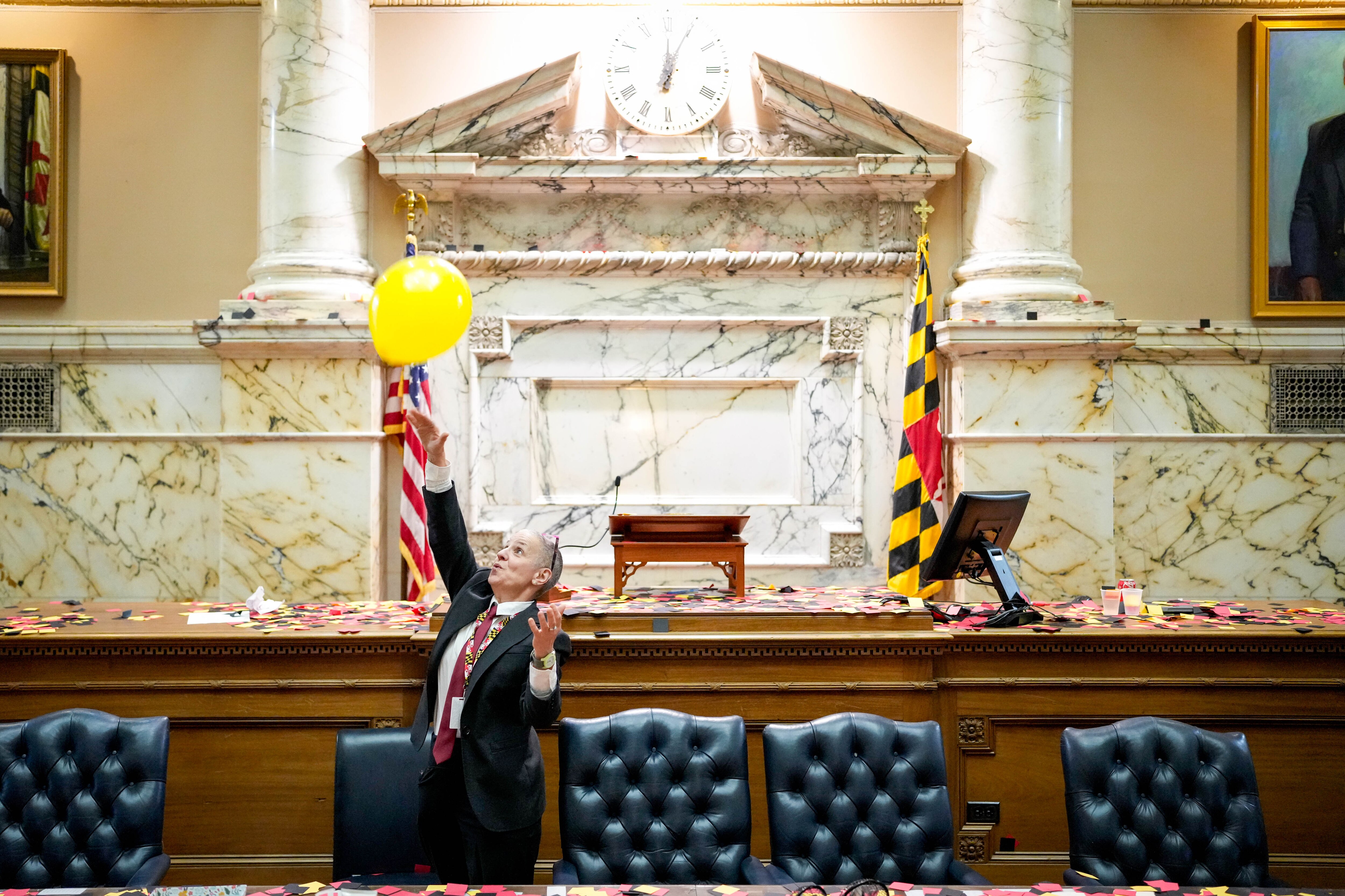 Jeanie Ferretti with the Speaker’s Office celebrates in the House Chamber at the Maryland State House on Sine Die in Annapolis, Md. on Monday, April 7, 2025.