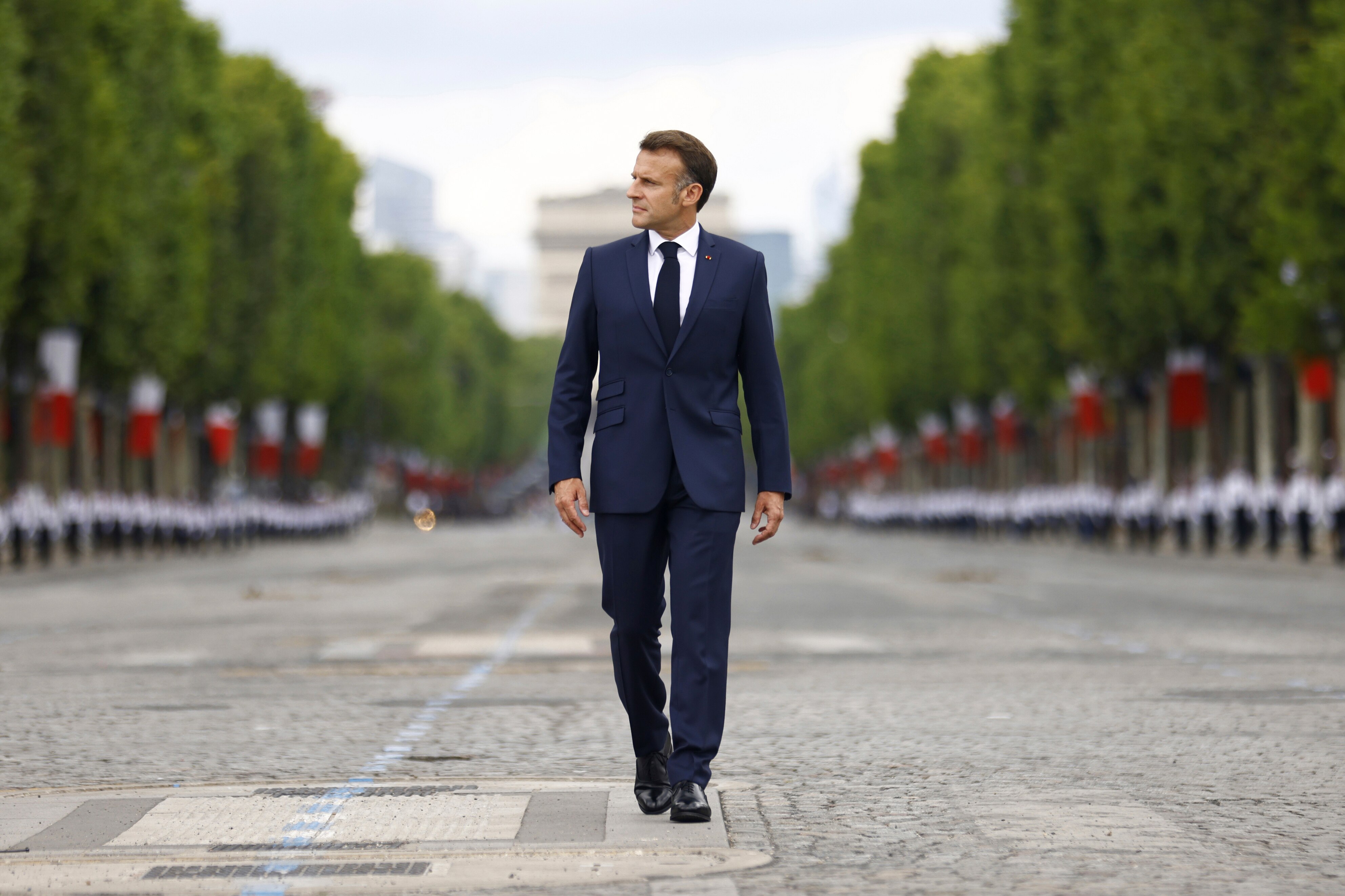 French President Emmanuel Macron arrives to the Bastille Day military parade on the Champs-Elysees avenue, in Paris, Monday, July 14, 2025.