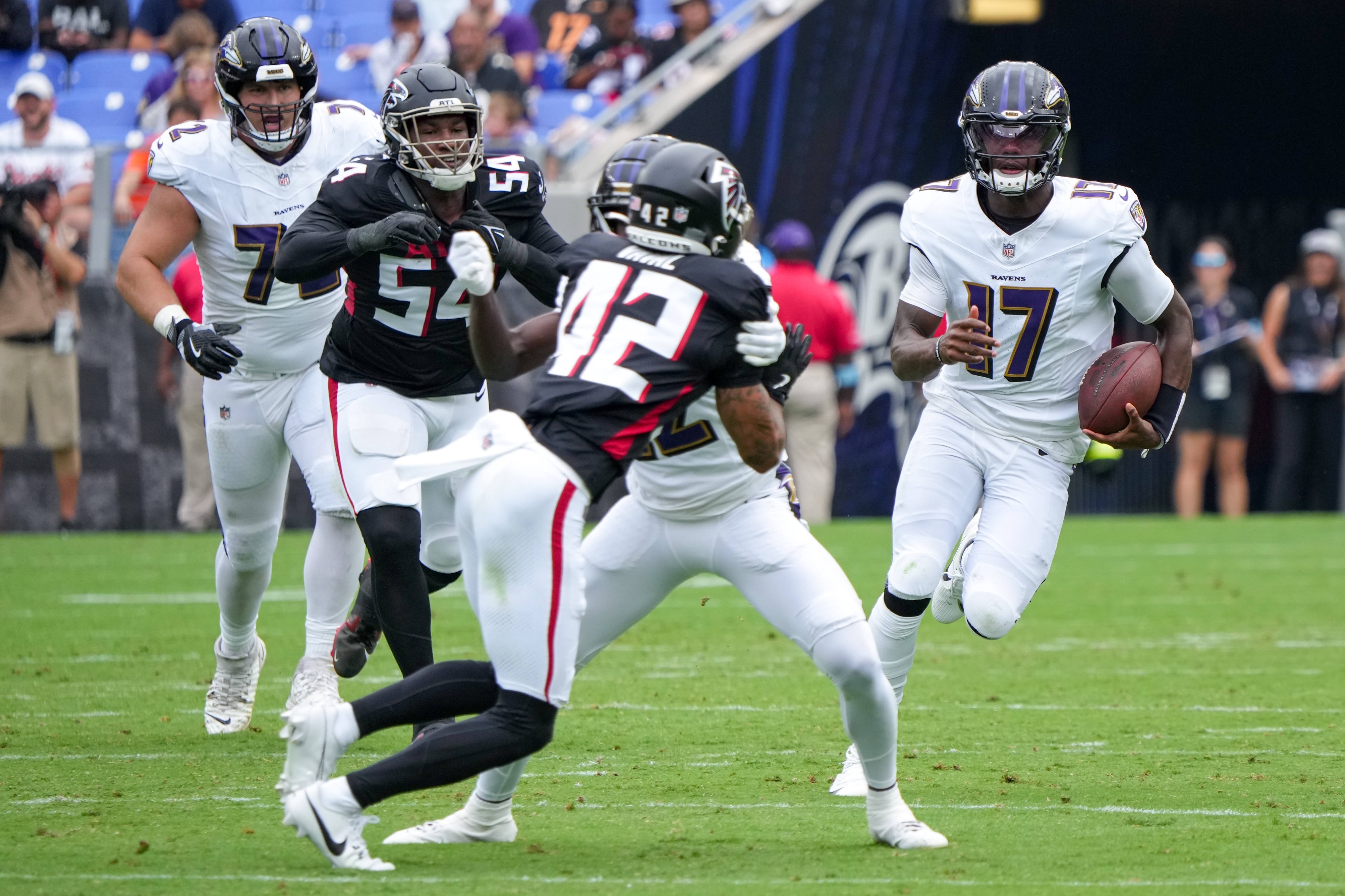 Ravens quarterback Josh Johnson (17) scrambles during a preseason victory over the Falcons on Saturday at M&T Bank Stadium.