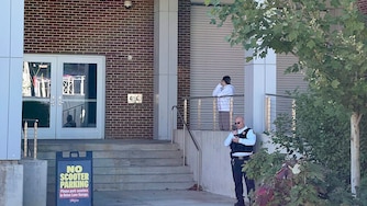 WEDNESDAY, OCTOBER, 21, 2026 - An officer stands by the Jones-Hill House at University of Maryland College Park after approaching student journalists on Wednesday.