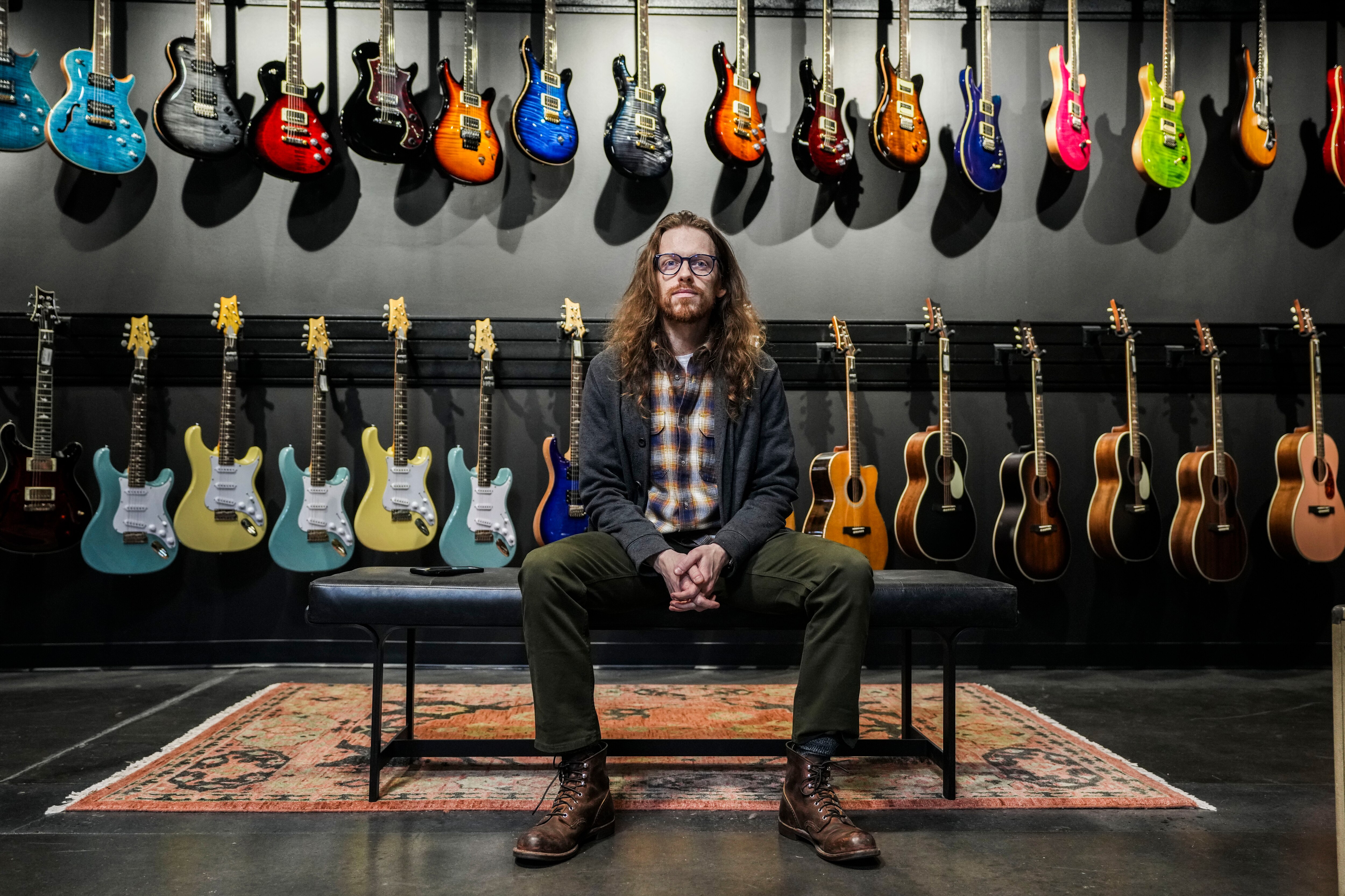 Scenes inside of the brand-new Baltimore Music Company  on May 2, 2023. Owner Steve Blake poses for a portrait.