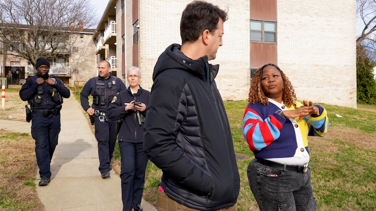 Annapolis Mayor Jared Littmann and Alderwoman Diesha Contee talk about Annapolis public housing conditions during a neighborhood door on March 14.
