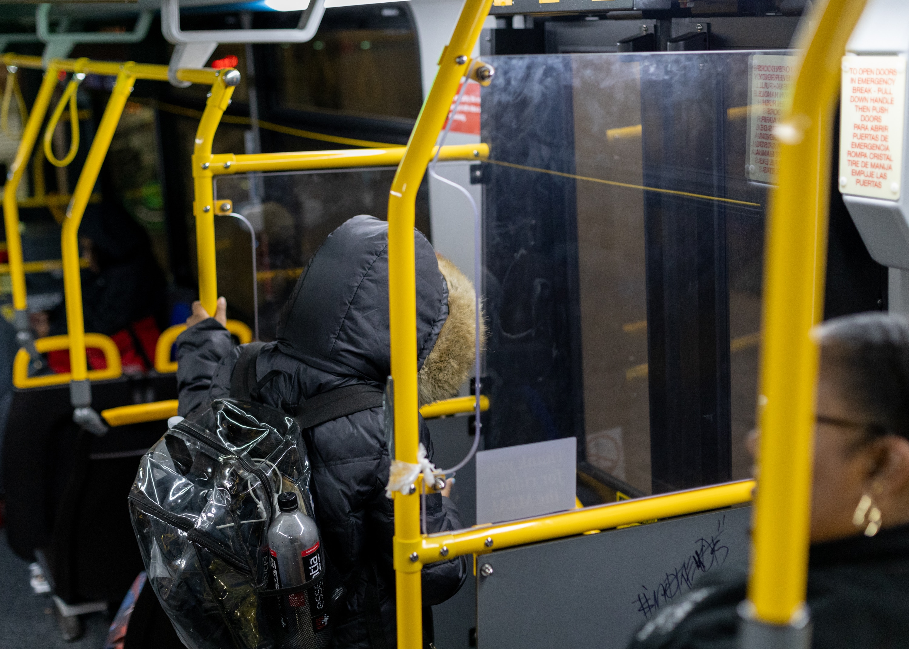 A’Nya Lucas, a senior at Mergenthaler Vocational-Technical High School, gets ready to transfer busses in downtown Baltimore, MD on Nov. 14, 2024. Lucas’ bus ride to school takes over an hour.
