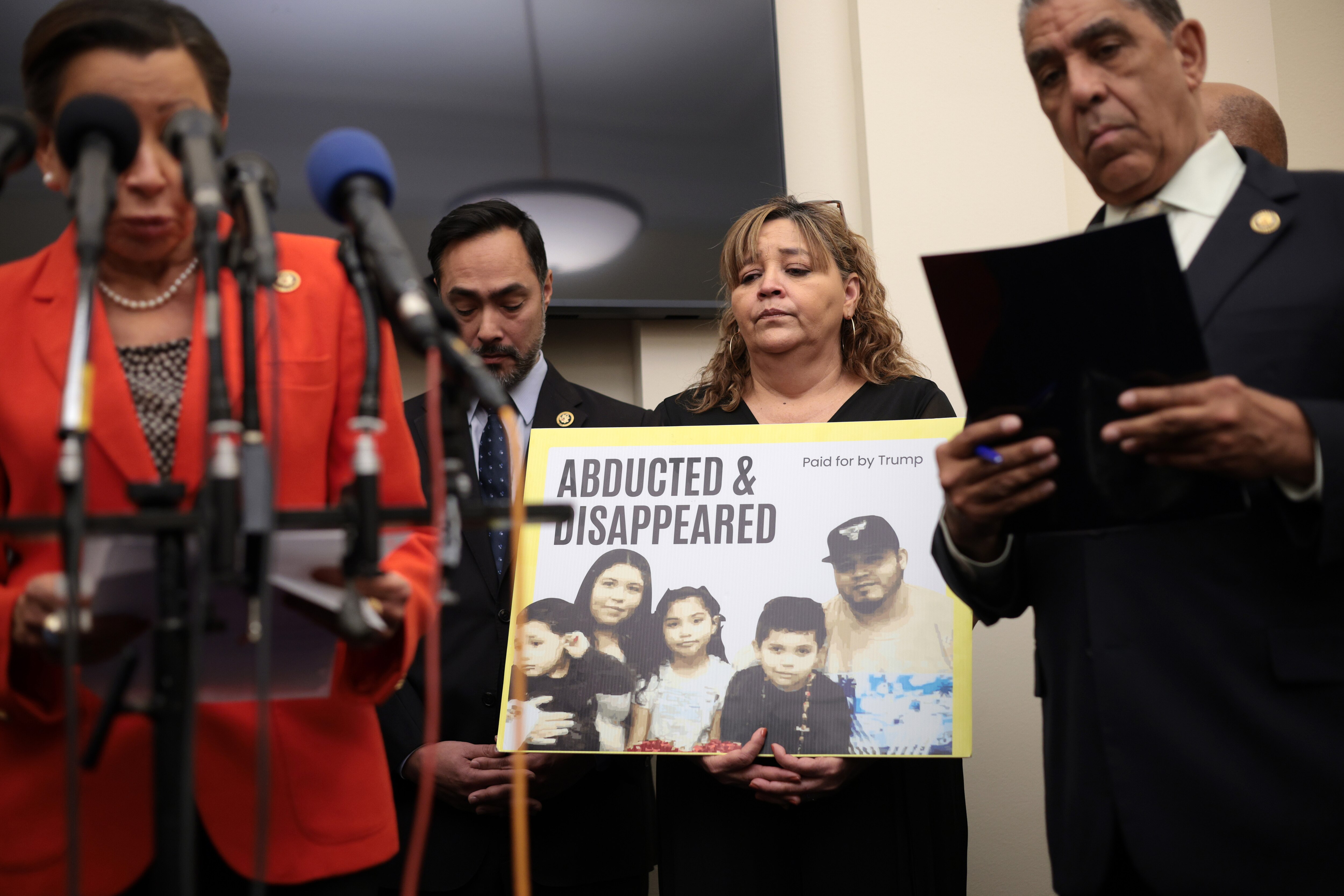 WASHINGTON, DC - APRIL 09: Mother (2nd R) of Kilmar Abrego Garcia holds a picture of her son and his family during a news conference to discuss his son's arrest and deportation at Cannon House Office Building on April 9, 2025 in Washington, DC. The Congressional Hispanic Caucus held a news conference to discuss the deportation of Maryland resident Kilmar Abrego Garcia to the maximum security prison Terrorism Confinement Center (CECOT) in El Salvador, an incident the Trump administration claims as “an administrative error,” but refuses to bring Abrego Garcia back to the United States.