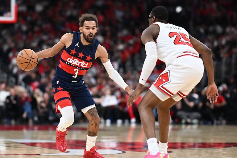 CHICAGO, ILLINOIS - OCTOBER 24: Trae Young #3 of the Washington Wizards dribbles the ball as Jalen Smith #25 of the Chicago Bulls defends during the first half at the United Center on October 24, 2026 in Chicago, Illinois. NOTE TO USER: User expressly acknowledges and agrees that, by downloading and or using this photograph, User is consenting to terms and conditions of the Getty Images License Agreement. (Photo by Daniel Bartel/Getty Images)