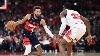 CHICAGO, ILLINOIS - OCTOBER 24: Trae Young #3 of the Washington Wizards dribbles the ball as Jalen Smith #25 of the Chicago Bulls defends during the first half at the United Center on October 24, 2026 in Chicago, Illinois. NOTE TO USER: User expressly acknowledges and agrees that, by downloading and or using this photograph, User is consenting to terms and conditions of the Getty Images License Agreement. (Photo by Daniel Bartel/Getty Images)