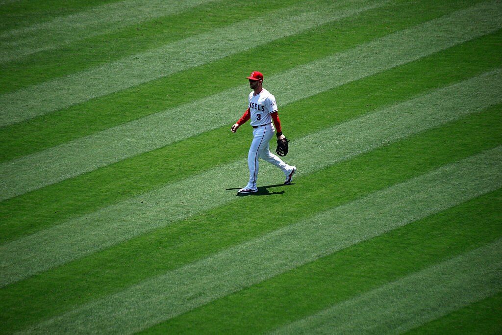Taylor Ward walks in the outfield before a Los Angeles Angels game against the Athletics on June 11.