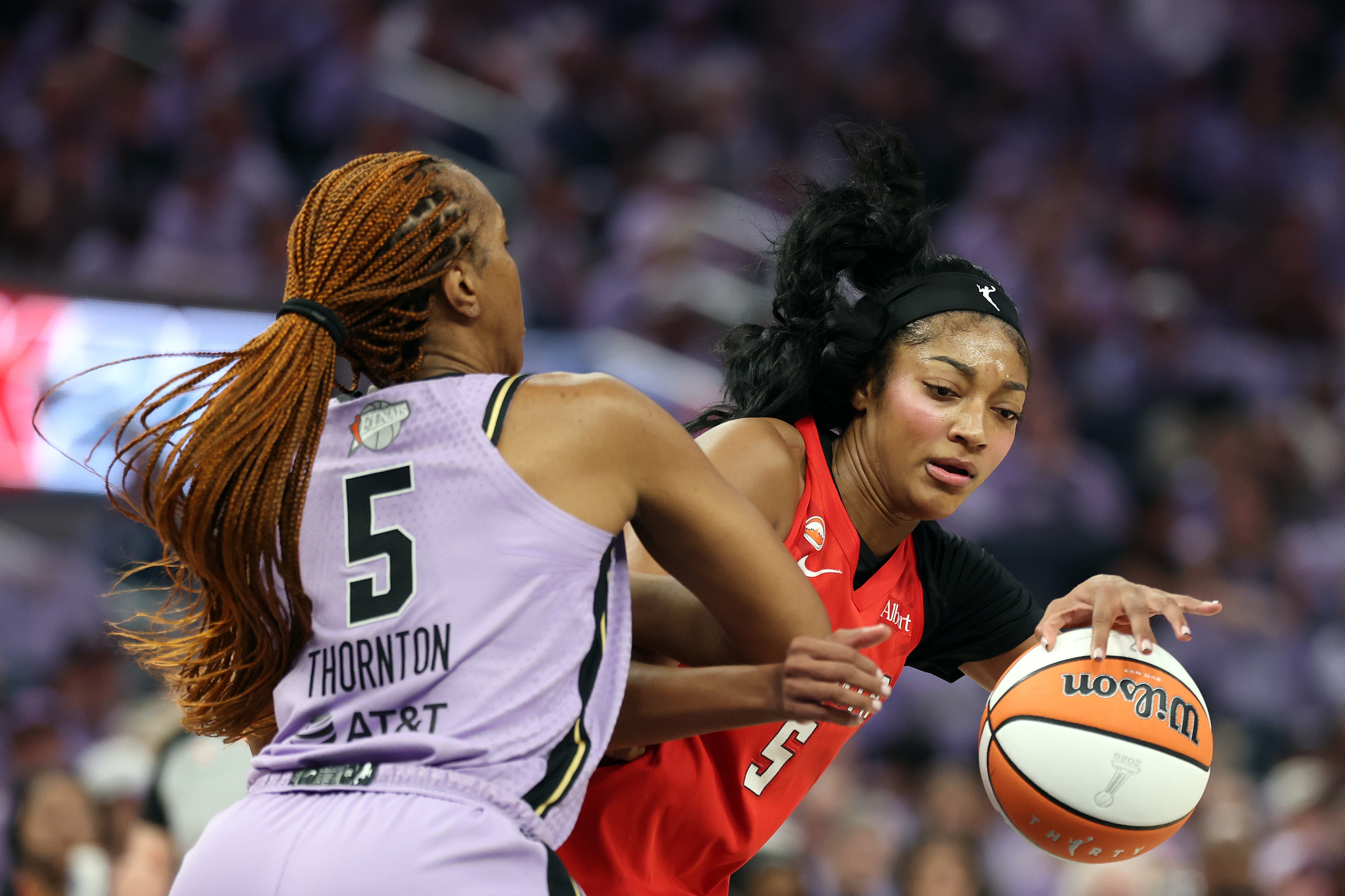 SAN FRANCISCO, CALIFORNIA - OCTOBER 17:  Angel Reese #5 of the Atlanta Dream is defended by Kayla Thornton #5 of the Golden State Valkyries during the first quarter in game one of the WNBA Finals at Chase Center on October 17, 2026 in San Francisco, California. NOTE TO USER: User expressly acknowledges and agrees that, by downloading and or using this photograph, User is consenting to the terms and conditions of the Getty Images License Agreement. (Photo by Ezra Shaw/Getty Images)