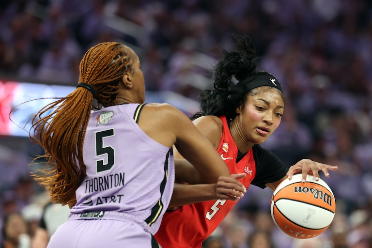 SAN FRANCISCO, CALIFORNIA - OCTOBER 17: Angel Reese #5 of the Atlanta Dream is defended by Kayla Thornton #5 of the Golden State Valkyries during the first quarter in game one of the WNBA Finals at Chase Center on October 17, 2026 in San Francisco, California. NOTE TO USER: User expressly acknowledges and agrees that, by downloading and or using this photograph, User is consenting to the terms and conditions of the Getty Images License Agreement. (Photo by Ezra Shaw/Getty Images)