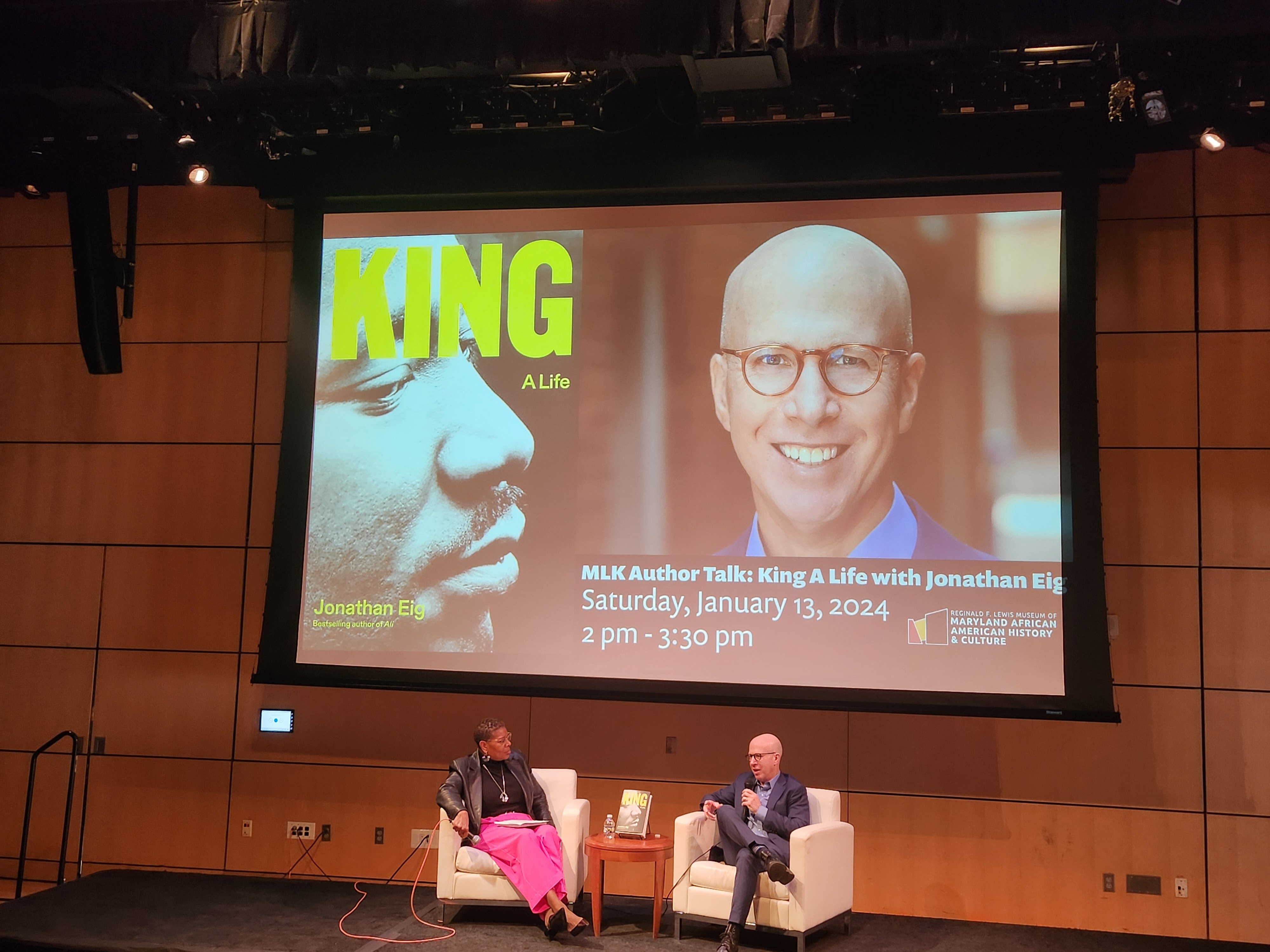 Martin Luther King biographer Jonathan Eig is interviewed at the Reginald F. Lewis Museum by museum President Terri Lee Freeman.